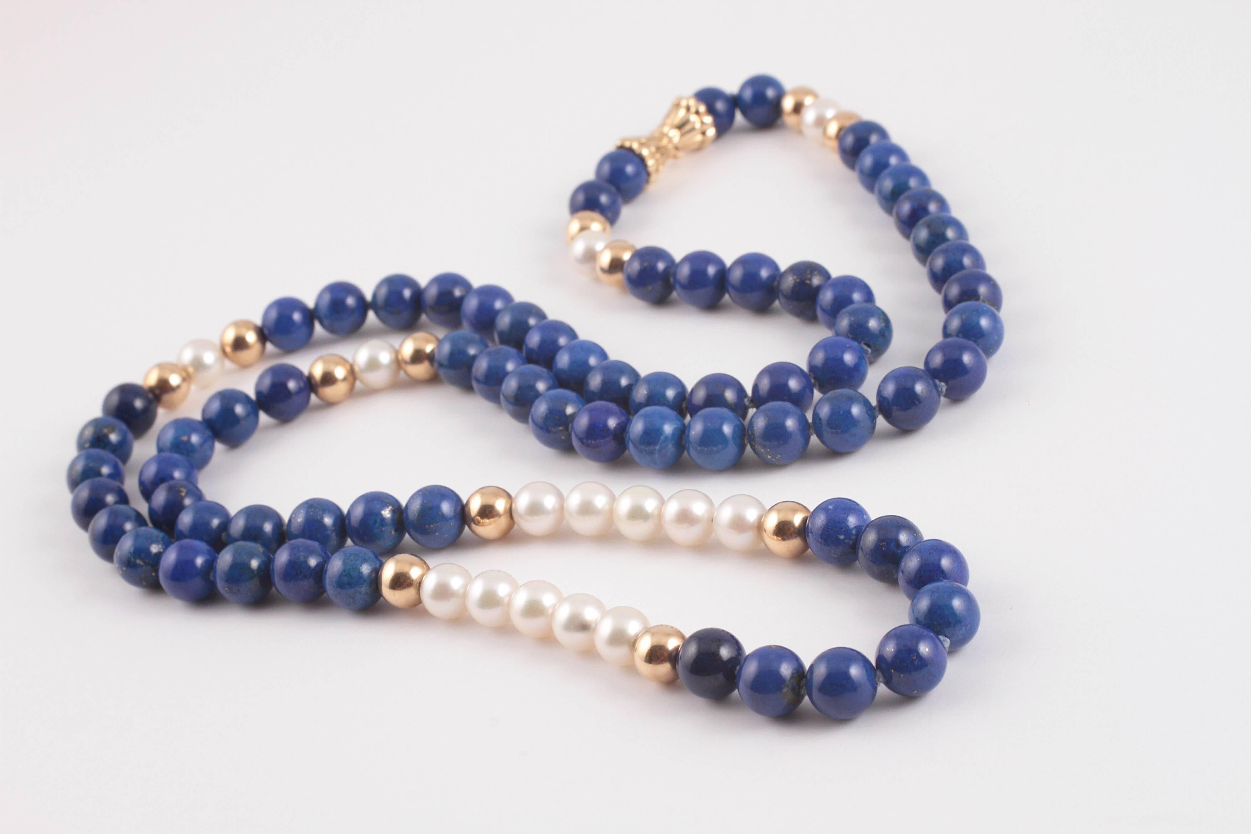 14K yellow gold and lapis lazuli beads with pearls. This lovely strand measures 31