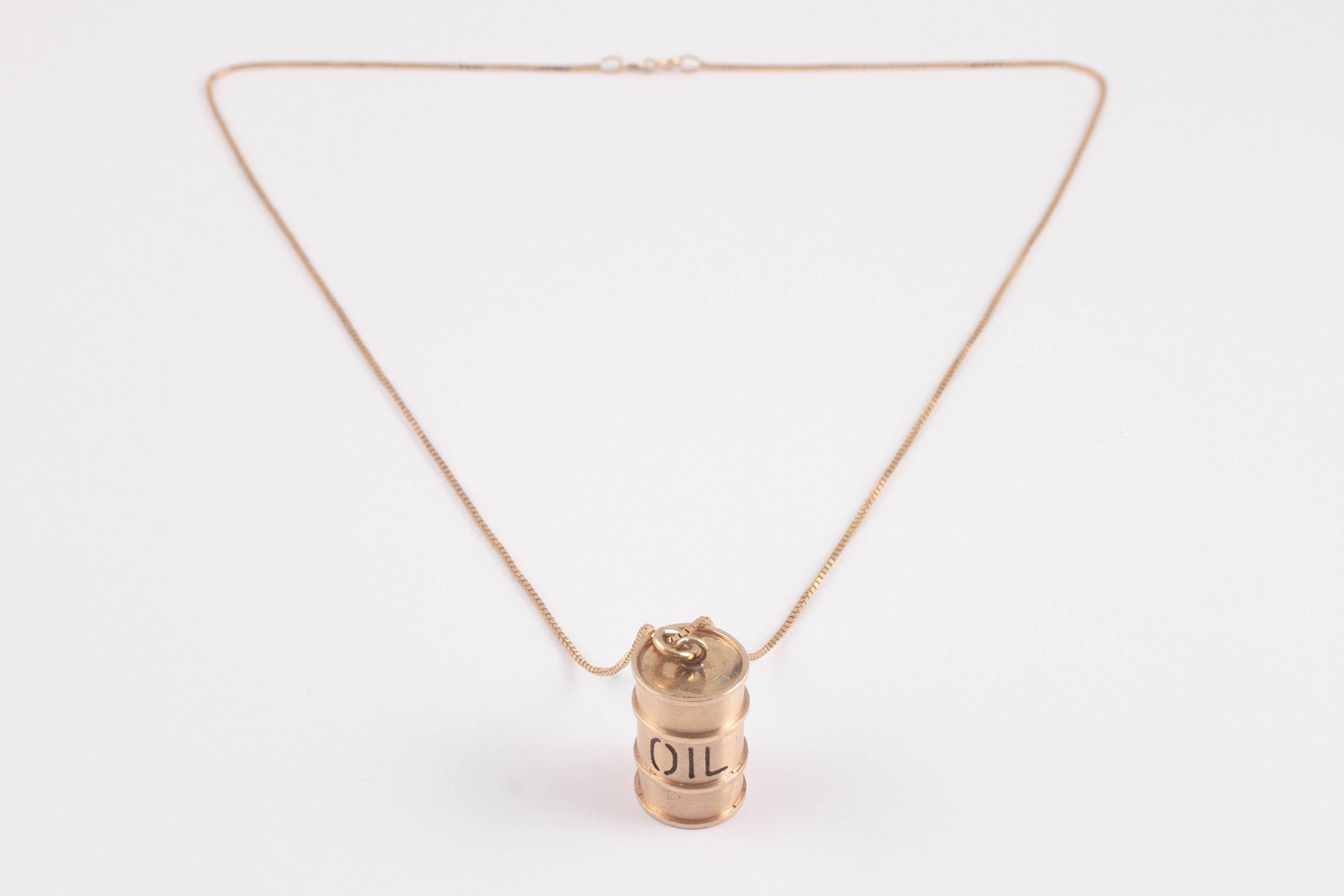 14 Karat Yellow Gold Barrel filled with Oil.  Whether you are an oil baron or just appreciate the humor of this little barrel, you'll have fun with the Oil Necklace. A great conversation starter. 