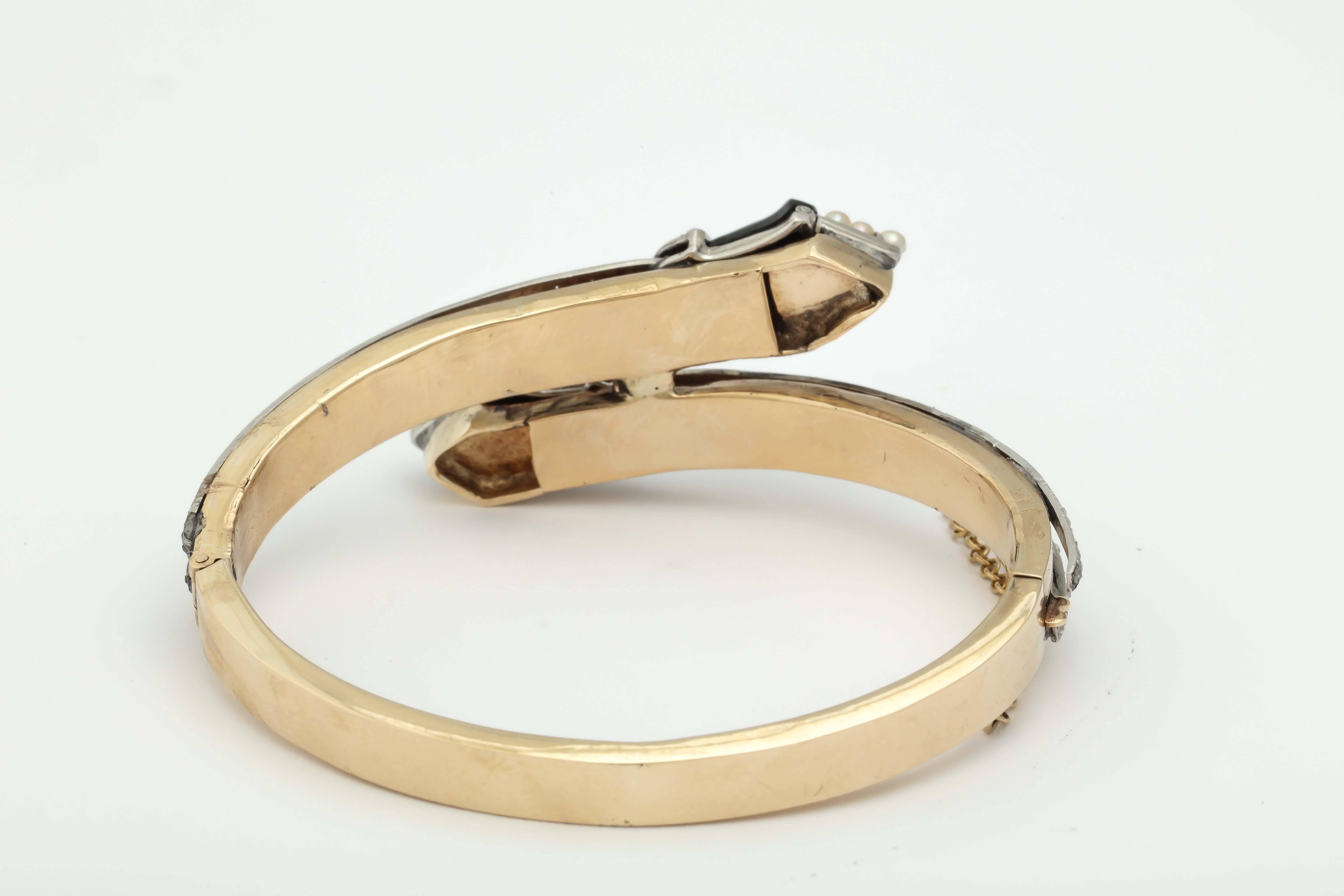 Edwardian Onyx Pearl Diamond Gold Platinum Crossover Bangle Bracelet In Good Condition For Sale In New York, NY
