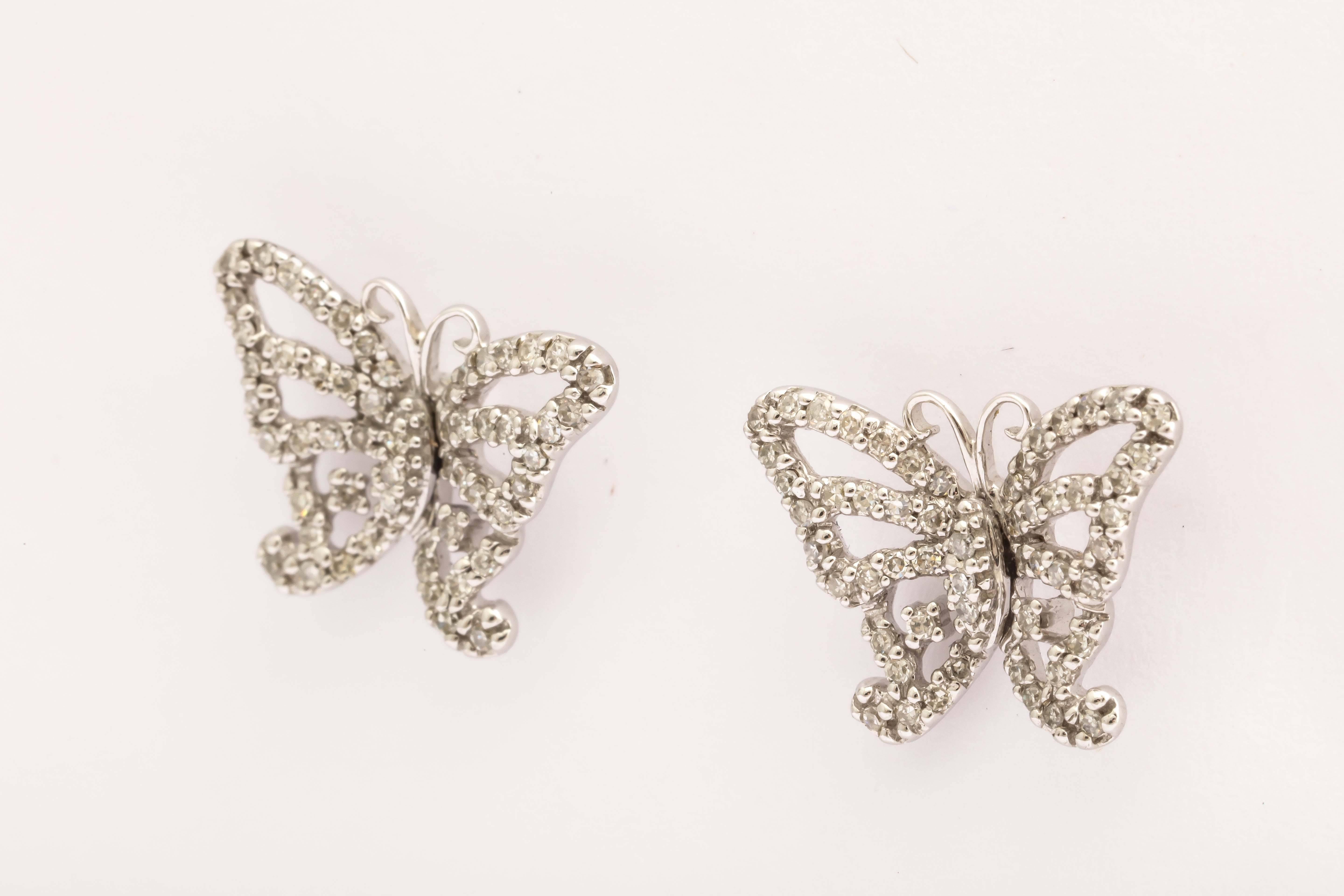 Sparkly 14kt  white gold and diamond butterfly earrings. Delicately set with .89 cts. white diamonds to light up your face. Fun to wear day or night.