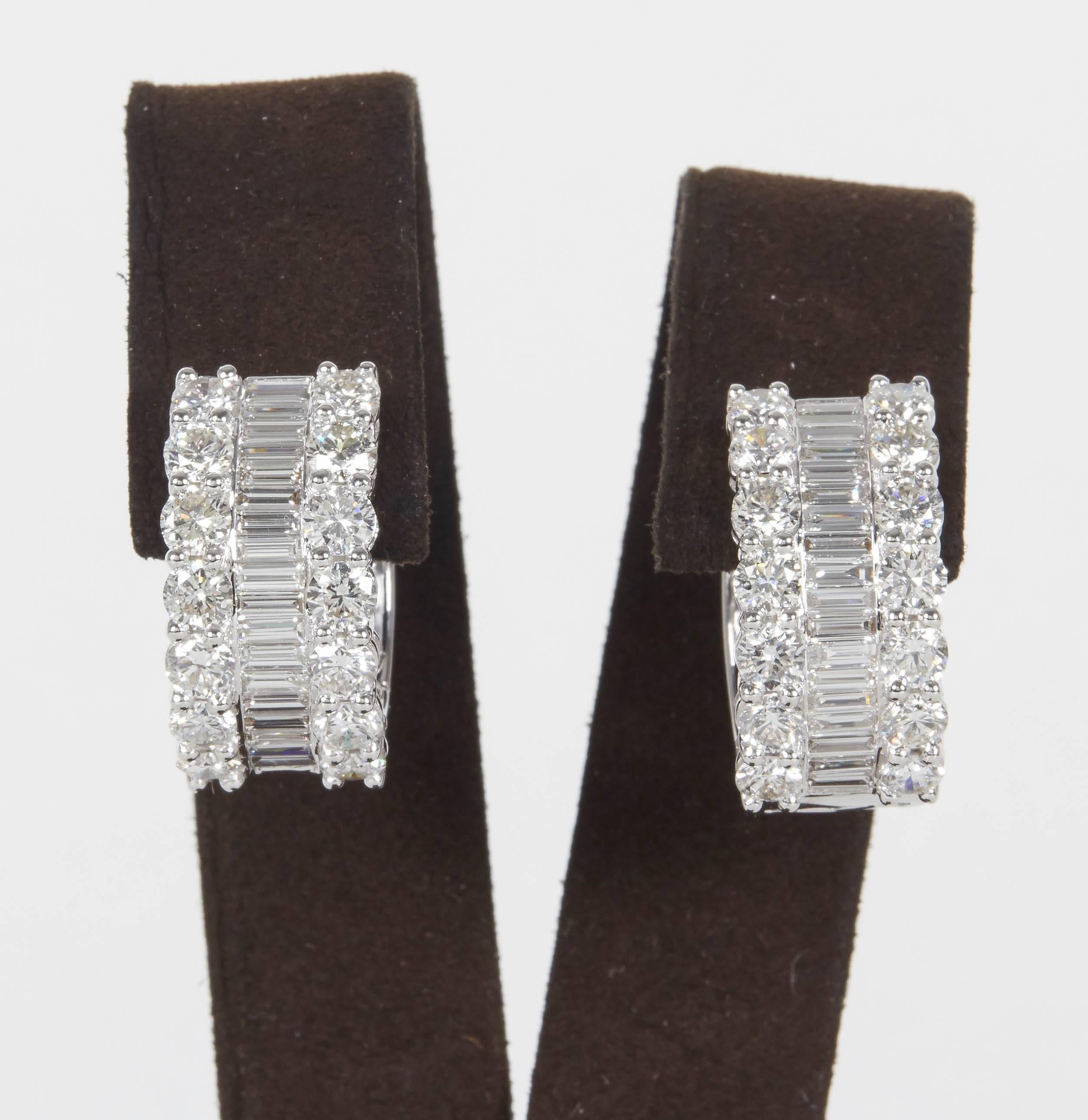 

A stunning design this earring is full of sparkle and fire.

6.36 carats of F color VS clarity diamonds set in 18k white gold. 

Approximately .41 inches wide and .85 inches long
