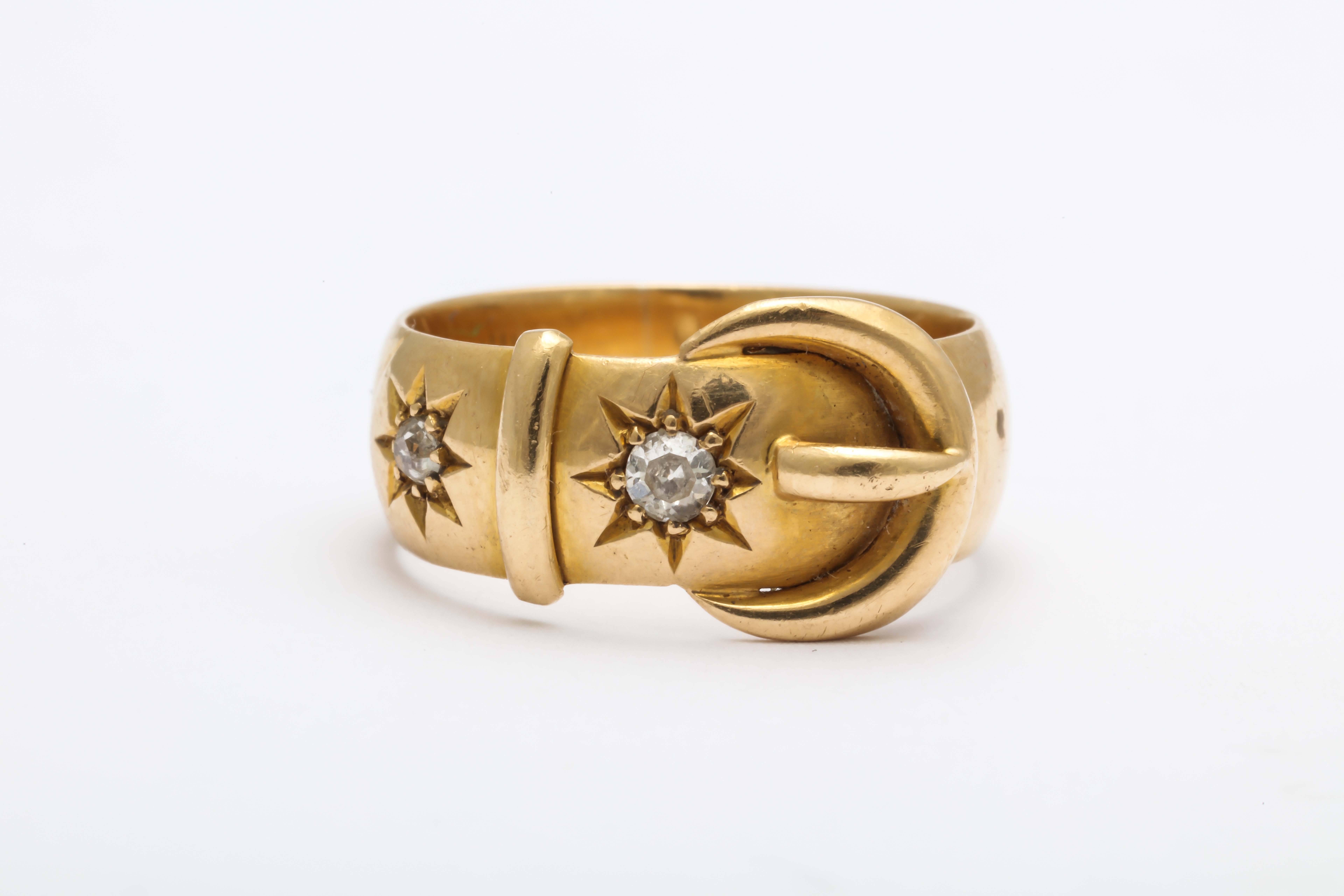The love of Victorian jewelry and its most popular motifs continued well on into the 20th c. This ring, made in Chester, England c.1915 is 18kt. Two Old European cut diamonds weighing approximately .05 and .03cts are set in 8 pointed star settings.