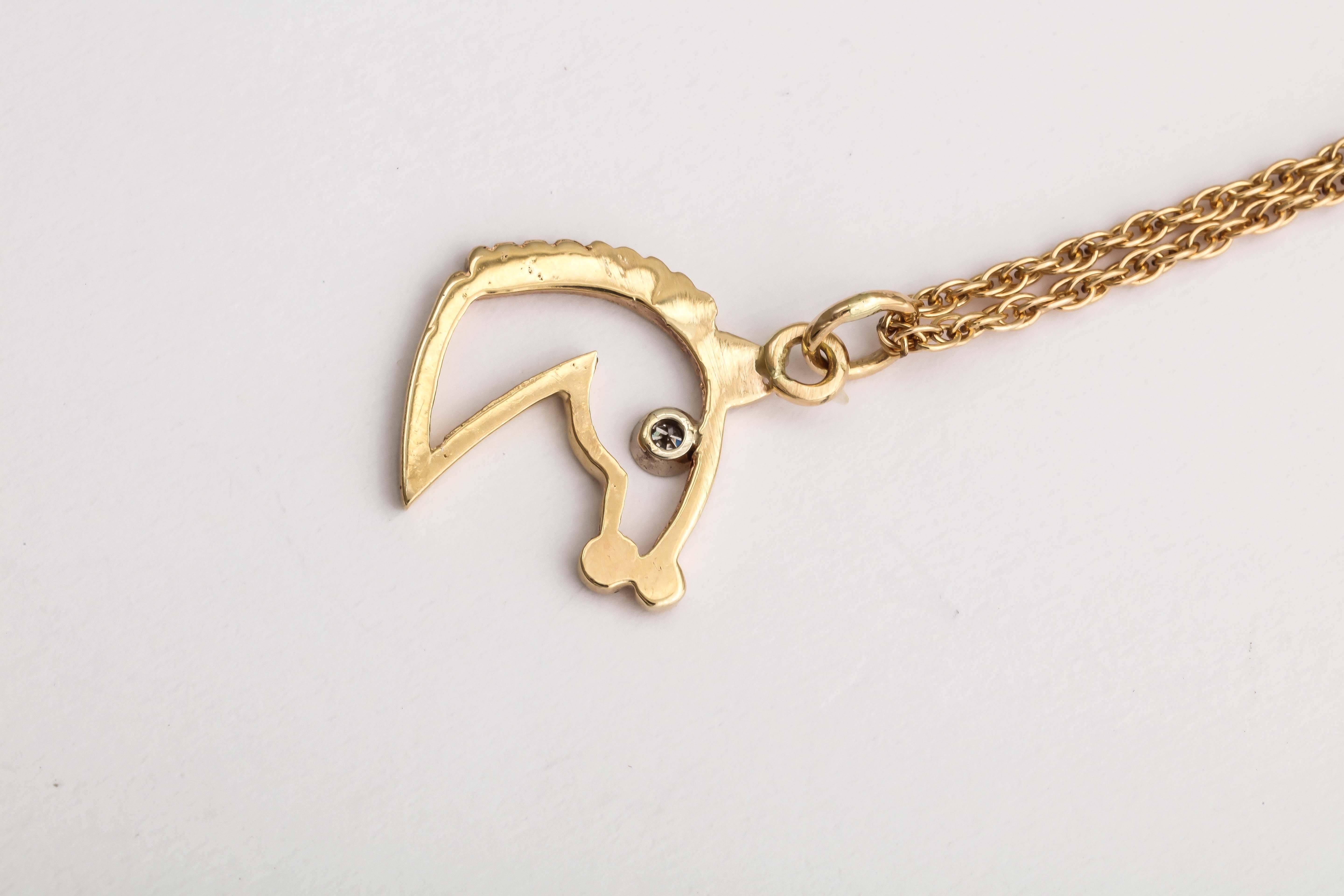 Contemporary Gold and Diamond Horse Head Pendant