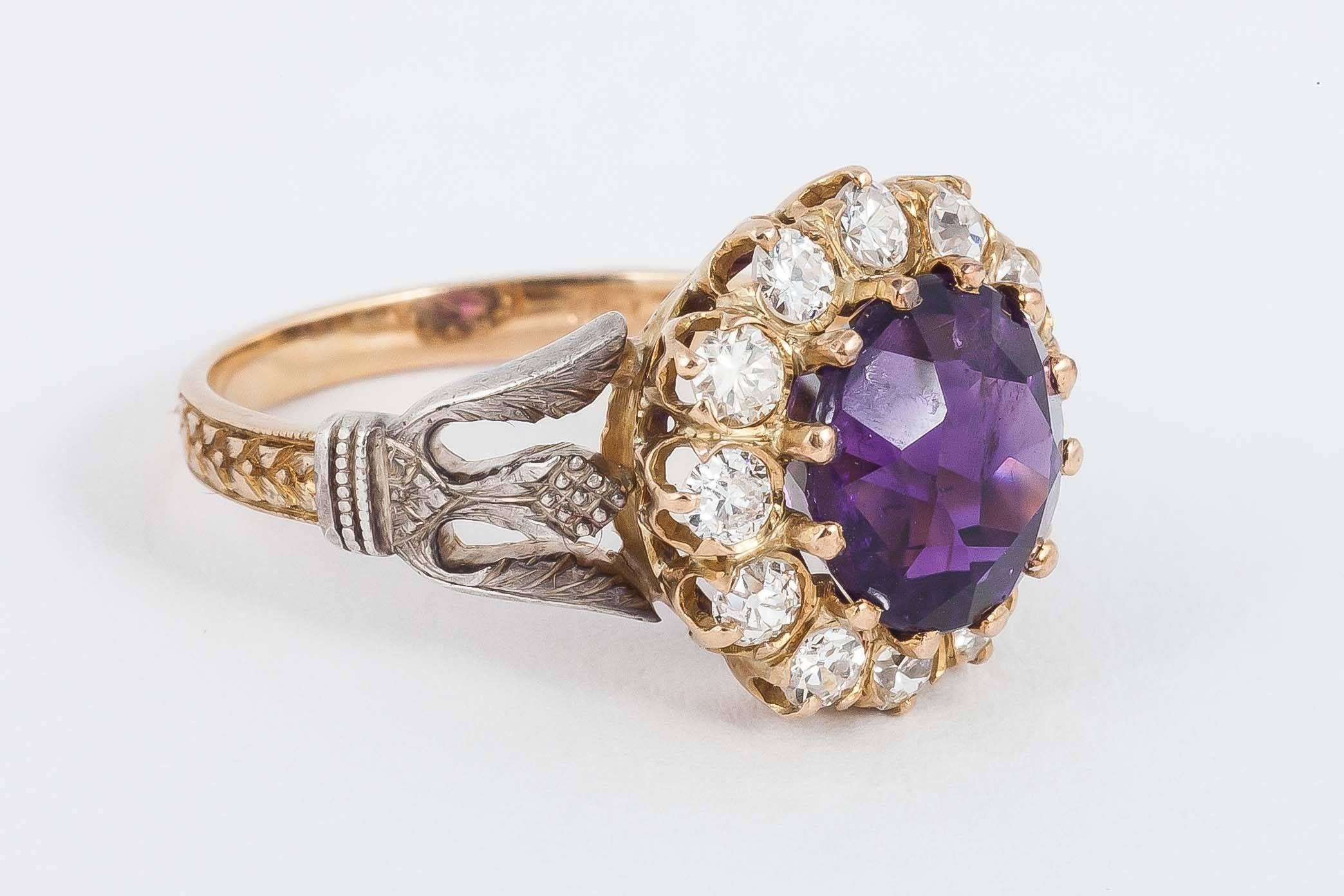 Amethyst and Diamond cluster ring set in 18ct (Gold

Finger size O