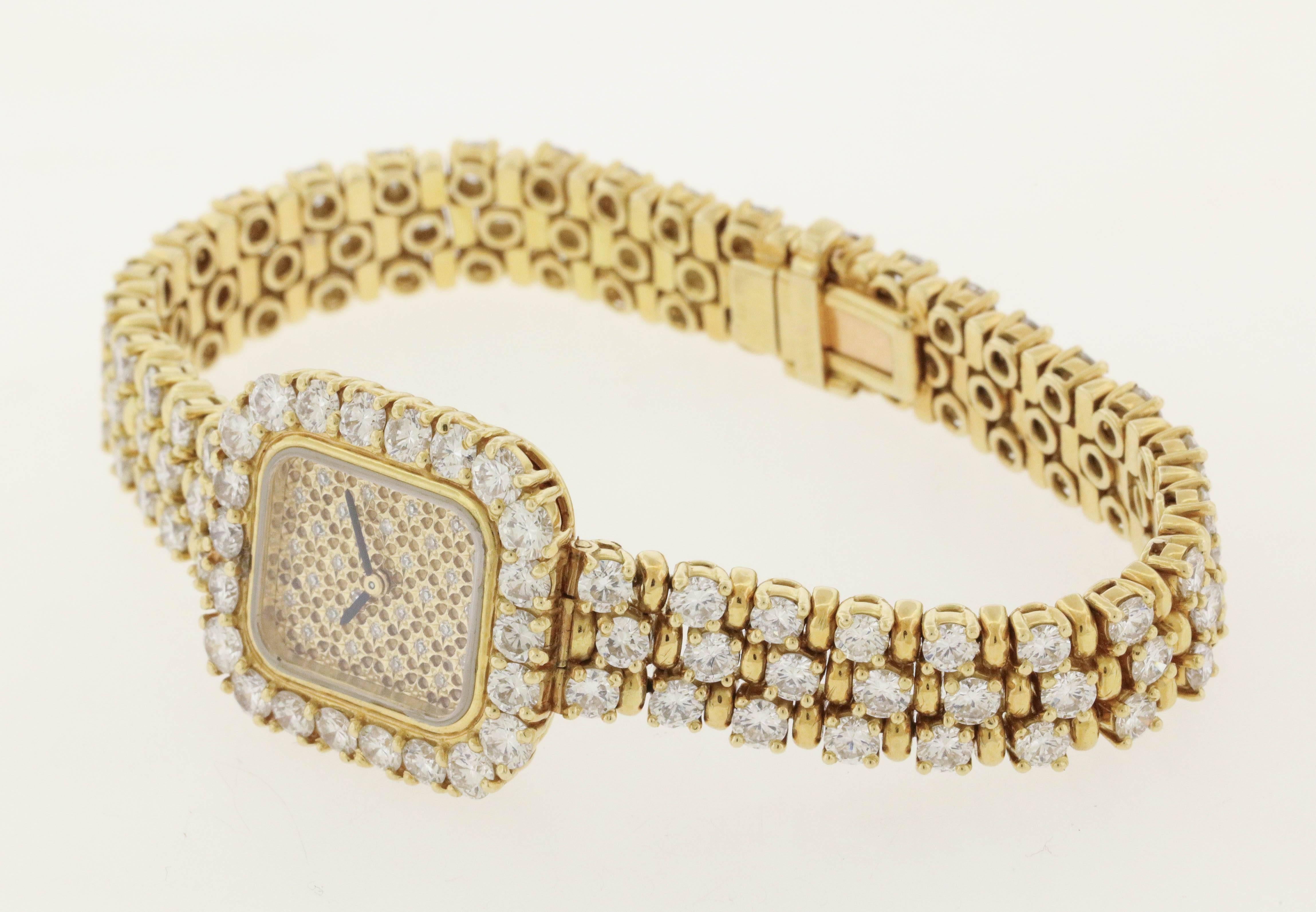 18K gold and diamond Audemars Piguet, circa late 1980's, is a  rectangular, 18K yellow gold and diamond women's quartz wristwatch with an 18K yellow gold Audemars Piguet diamond set link bracelet, 6-1/2
