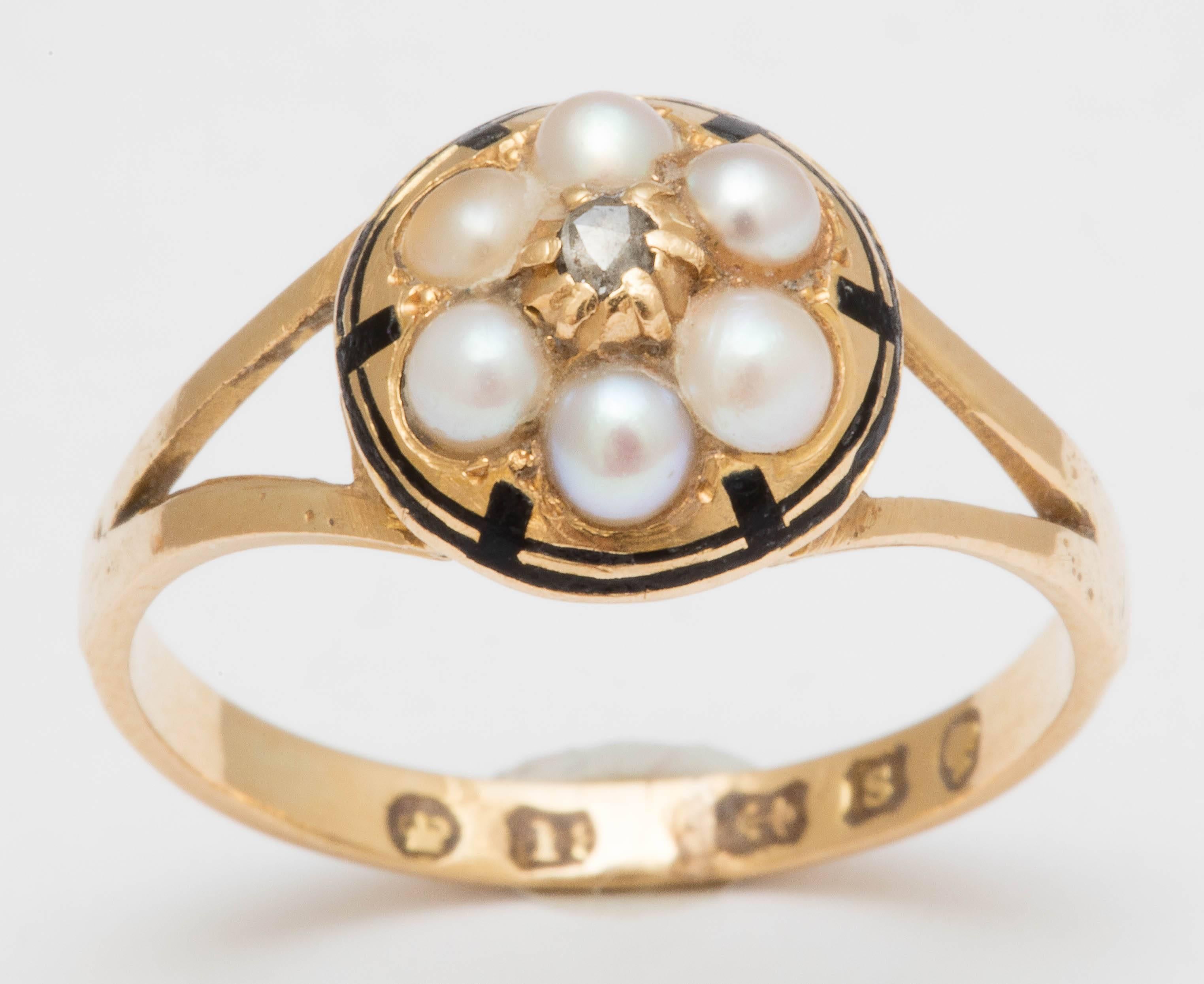 The perfect cluster 18K yellow gold and black enamel ring. 6 pearls surround a center rose cut diamond. Hallmarks for Birmingham, England, 1867. 