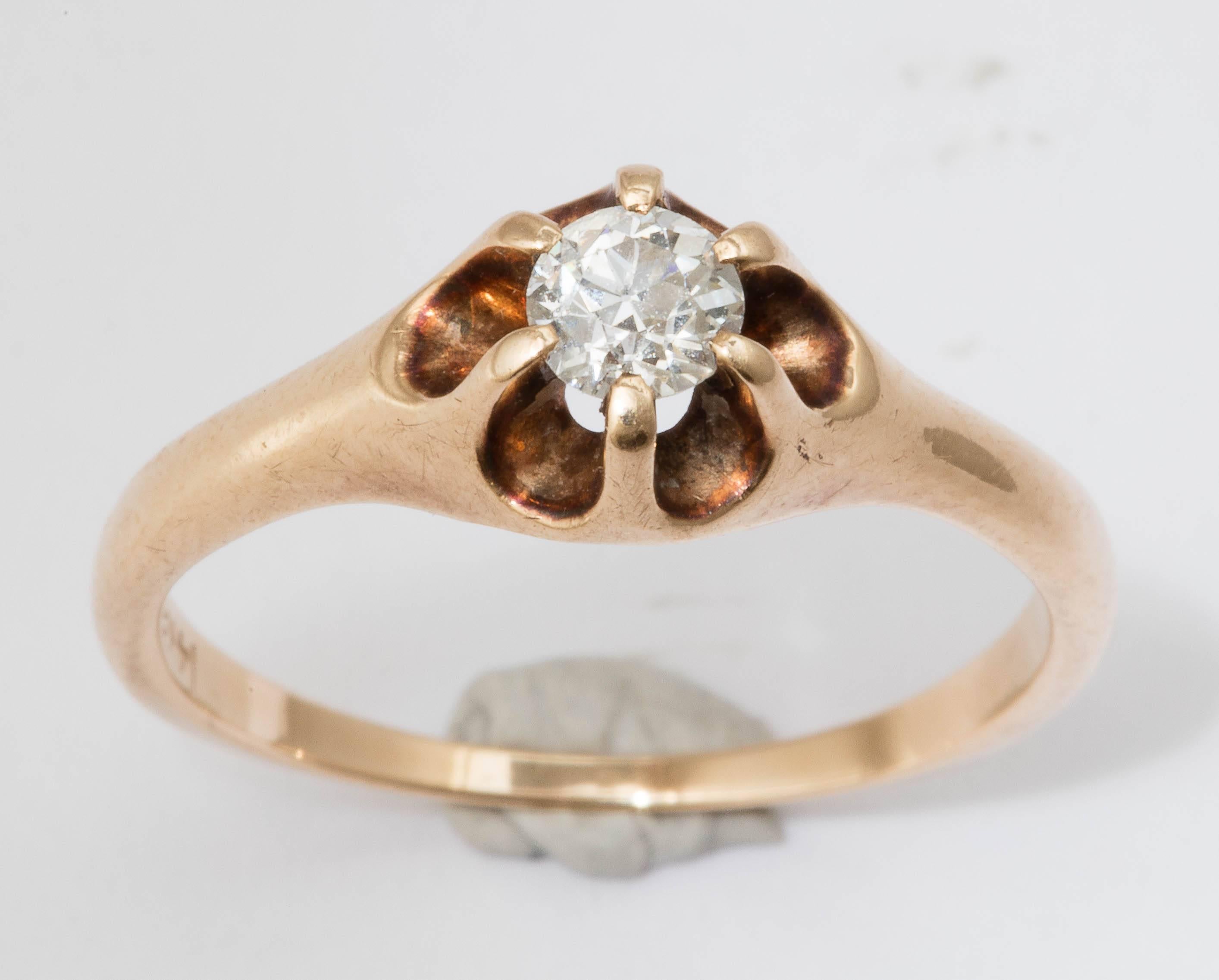 Lovely c.1900 14K yellow gold ring with a belcher set Old European cut diamond. The diamond weighs approximately .30cts. A classic style of this period for American jewelry. 