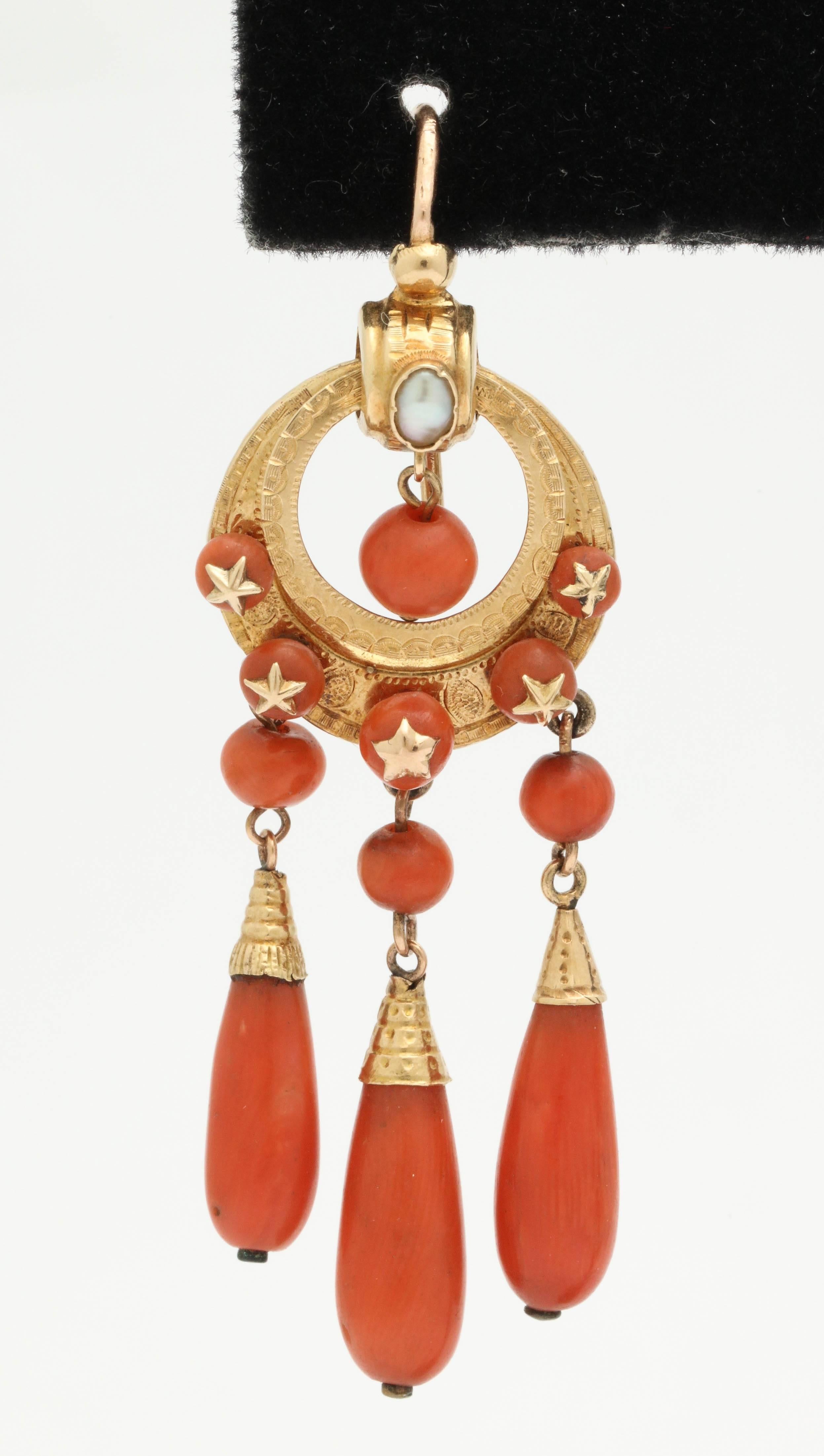 14kt Yellow Gold Fringe Drop Dangle Earrings Designed With 6 Tear-Drop Shaped Coral Stones And 18 Round Cut Coral Pieces in Which 10 Coral Pieces Are Beautifully Designed With 14kt Yellow Gold Star motifs.Made In The Victorian Era In the United