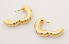 gold diamond tubular hoop earrings