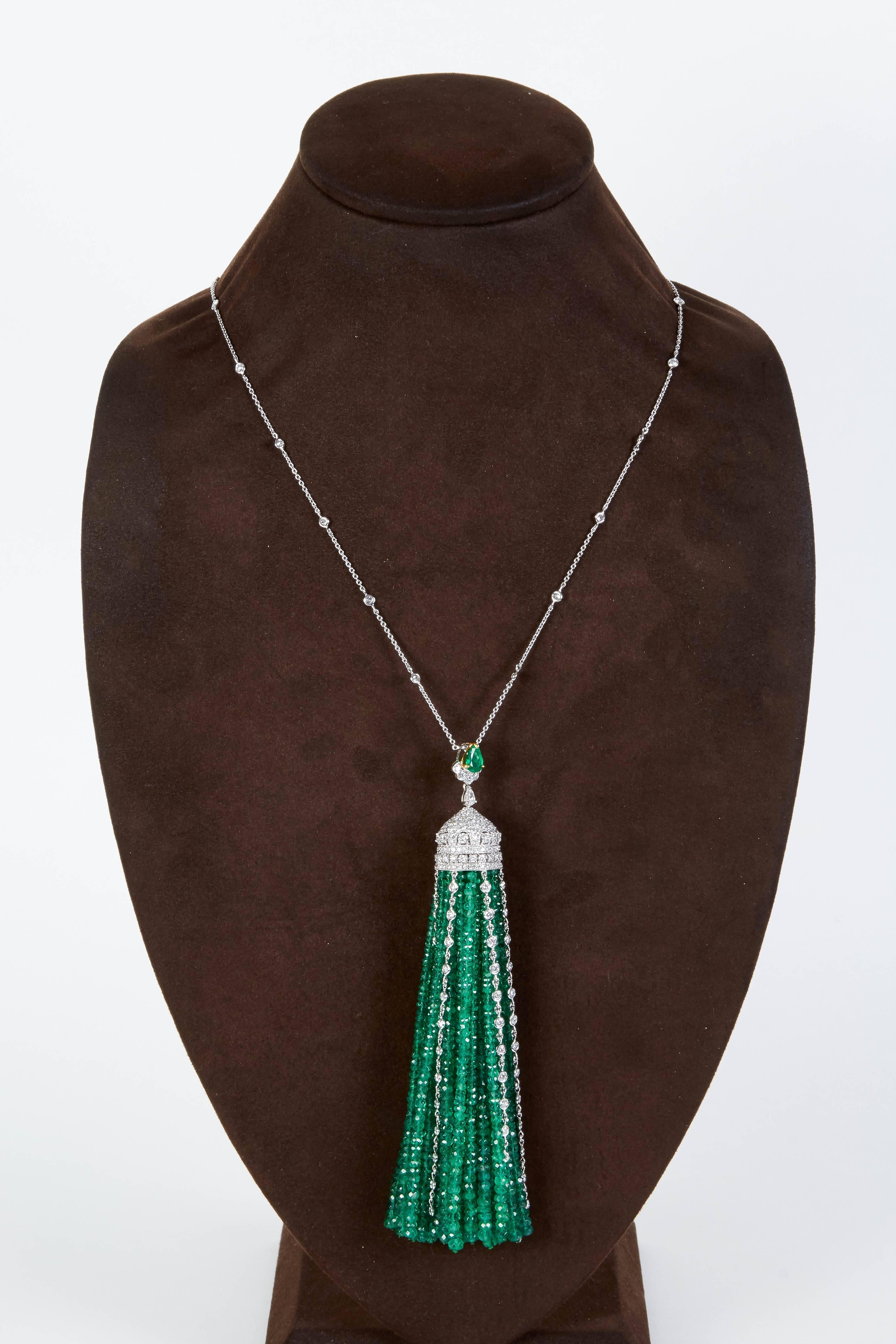 

A FABULOUS PIECE!!!

Over 300 carats of emeralds, 11.13 carats of diamonds.

24 inch chain. 

18k white gold

This piece can be warn casually or to a black tie affair, a great item to add to any collection. 

Matching earrings are