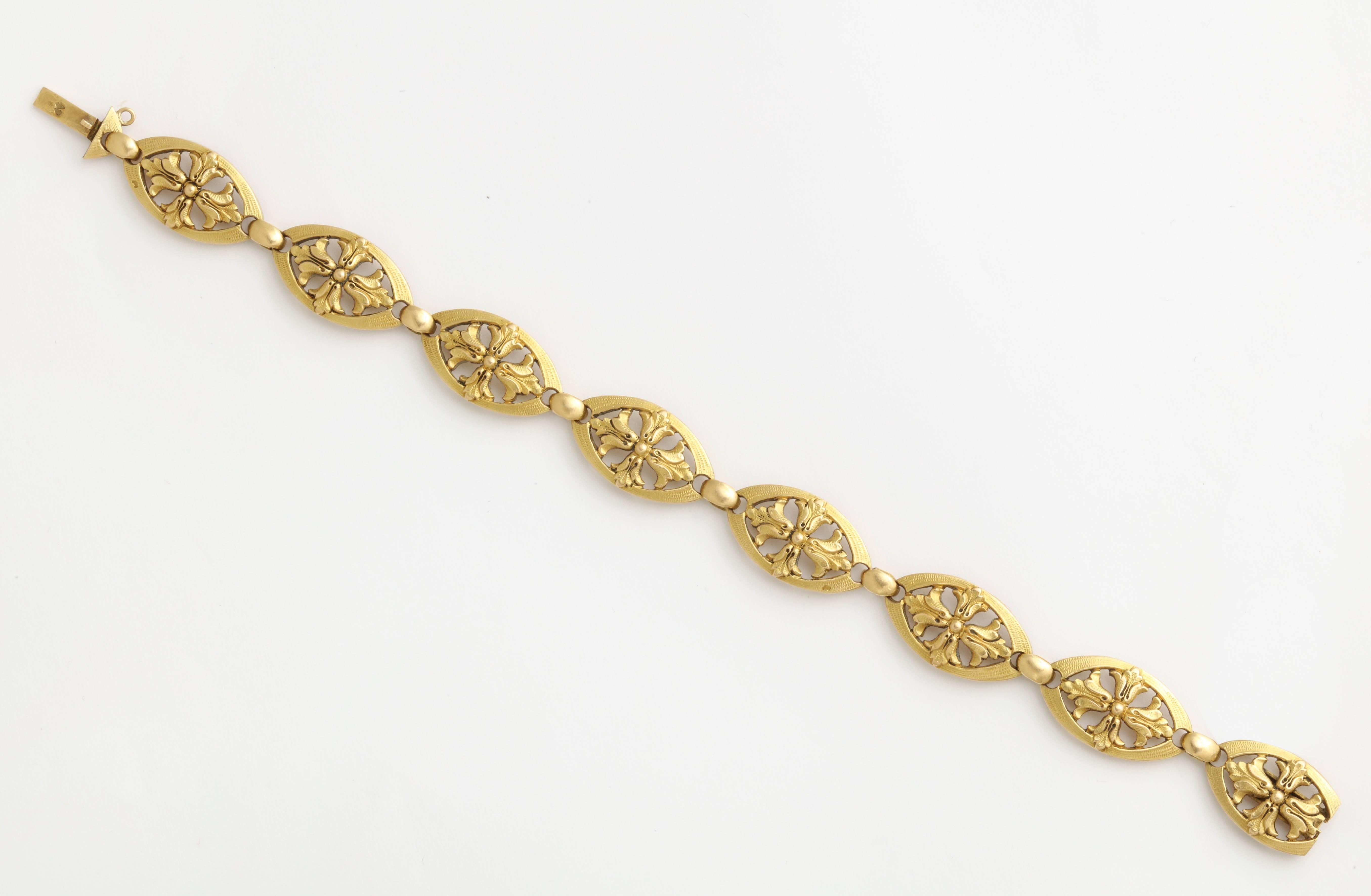 This beautiful link bracelet in 18K yellow gold is French Art Nouveau and hallmarked on the clasp. 