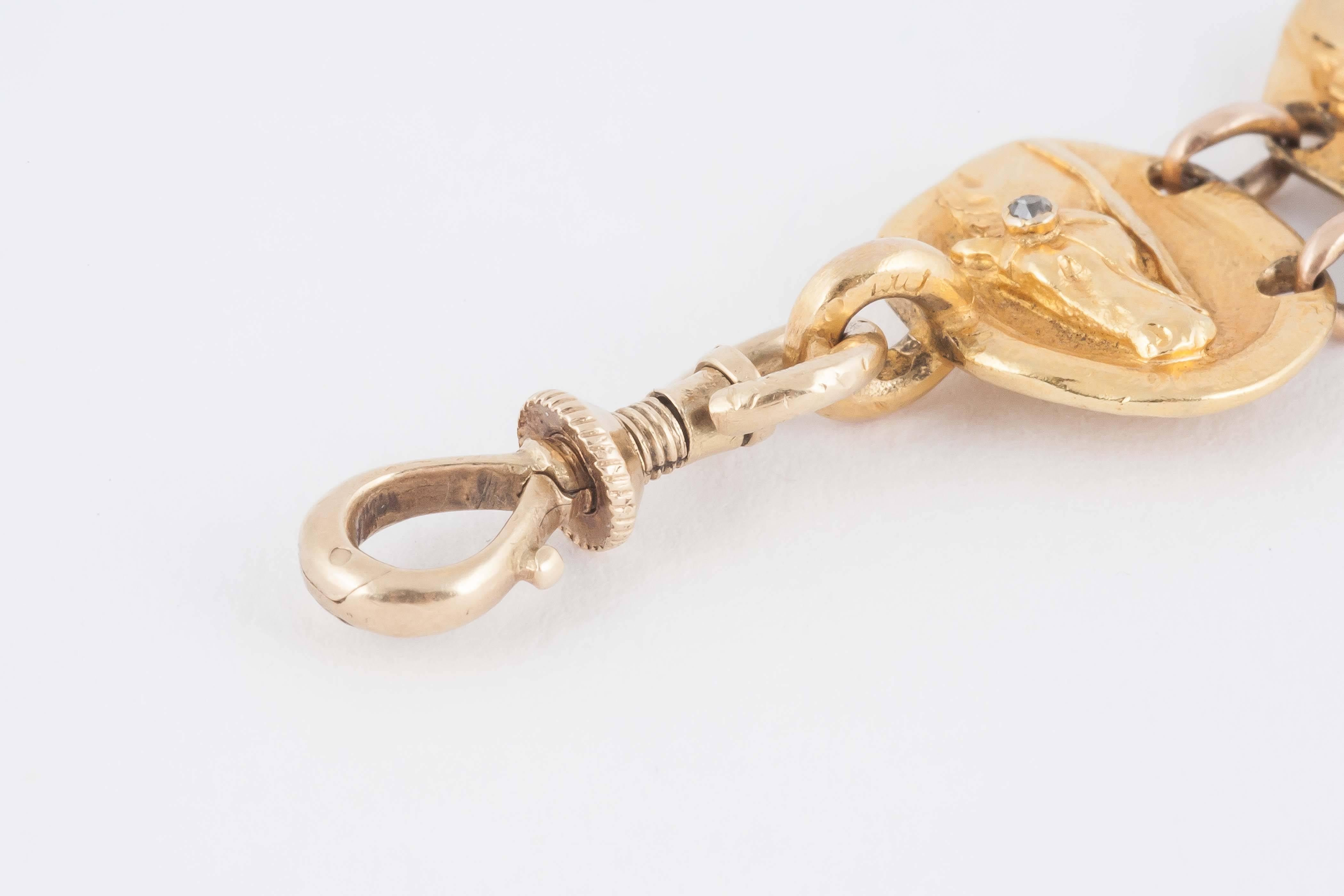 Equestrian , Diamond and 14kt, Gold Fob Pendant of 4 Racehorse Heads, c, 1900  1