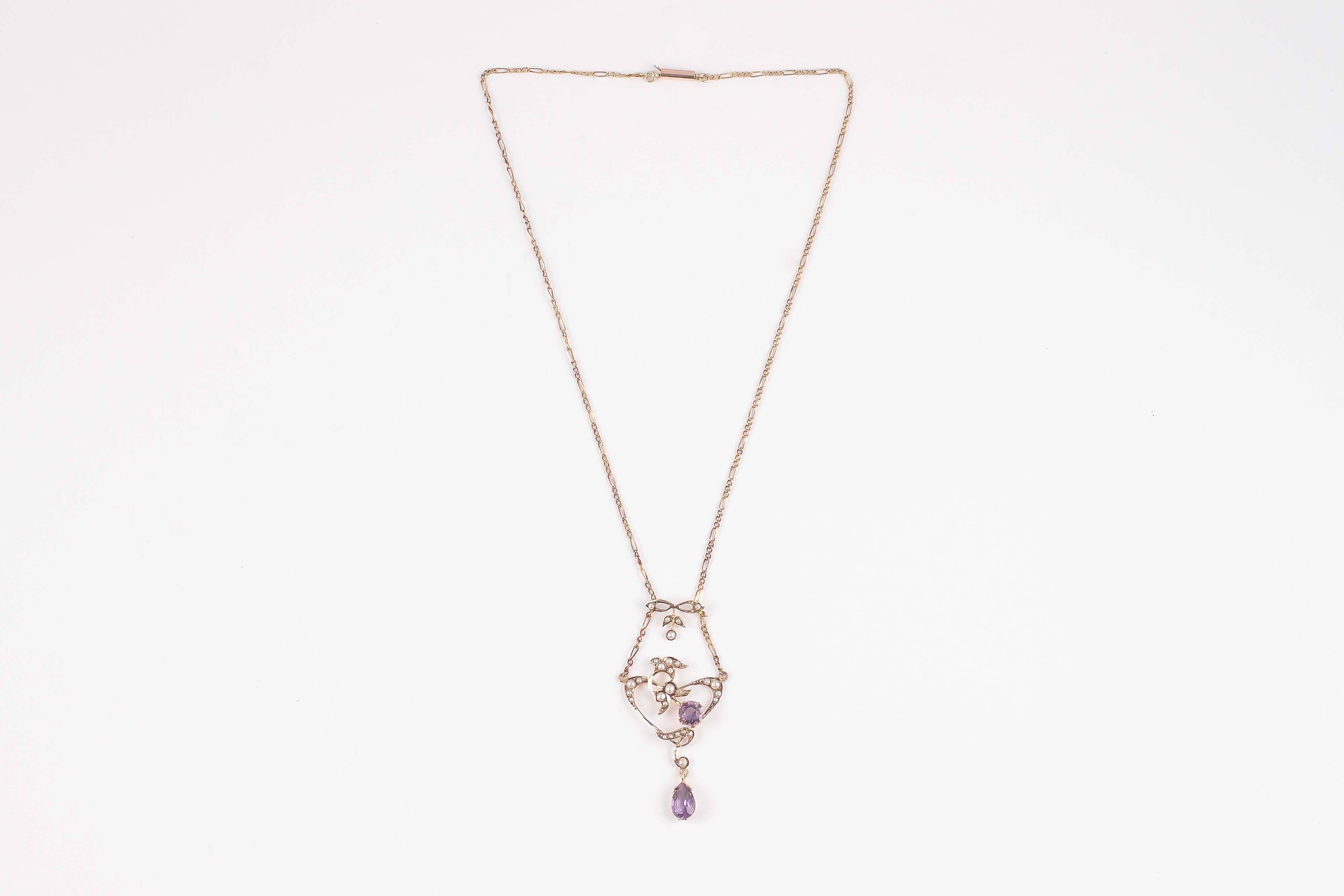 English beauty, delicate and whimsical with amethyst and seed pearls!  Chain is 16 inches.