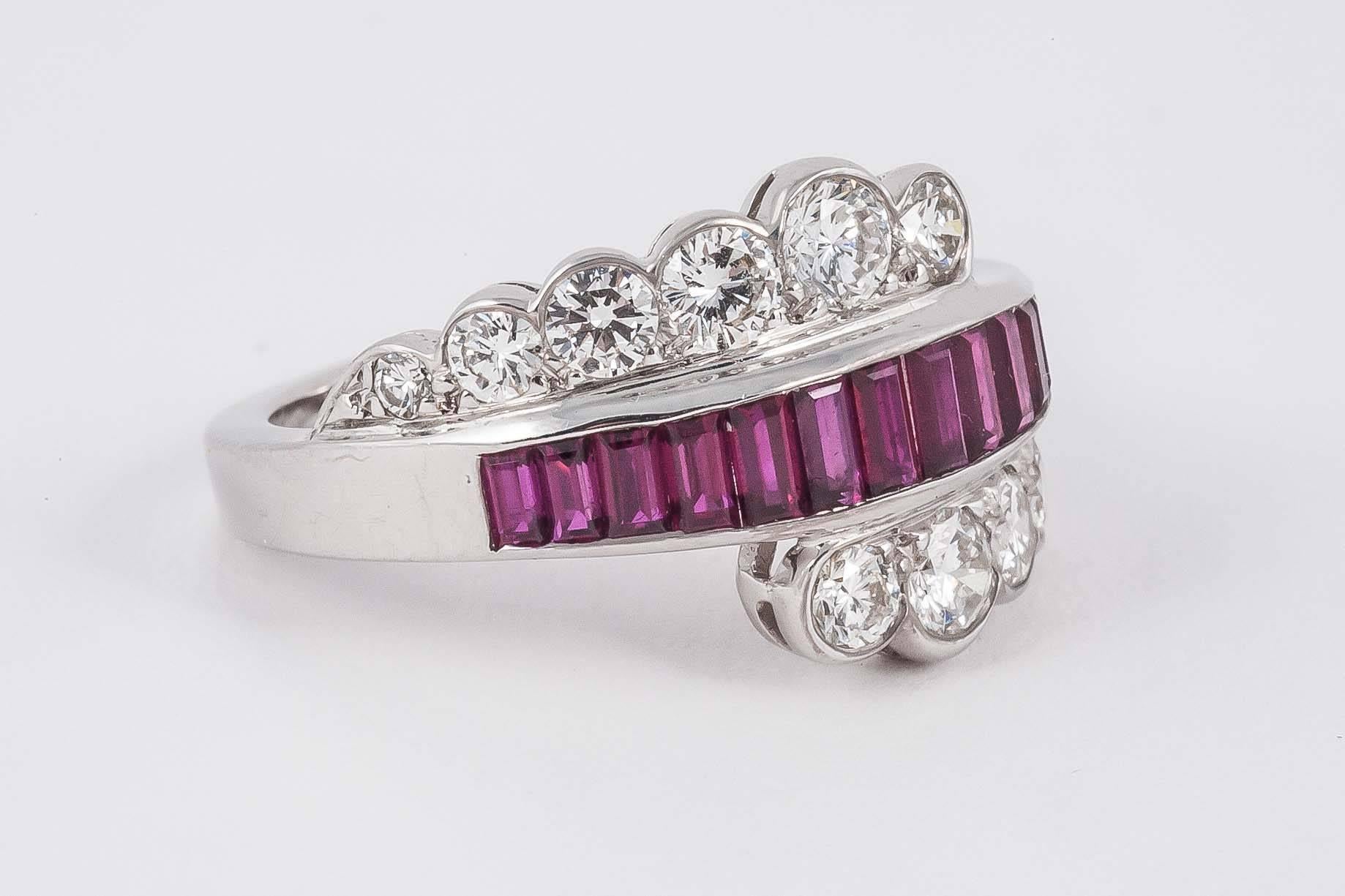 Stylish dress ring set with calibrated natural Burma Rubies and Diamonds. Set in 18ct white gold

Finger size N