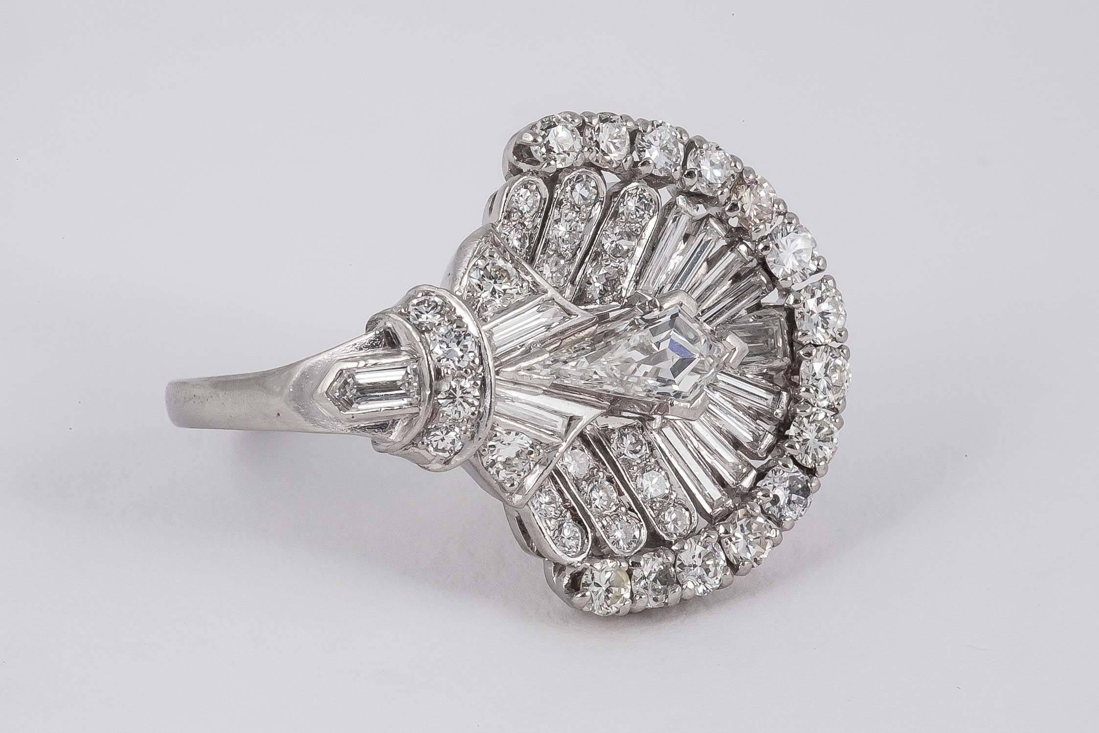  Fan shaped Diamond cocktail ring set with mixed cut diamonds 2.5/3 cts. Set in Platinum

Size L