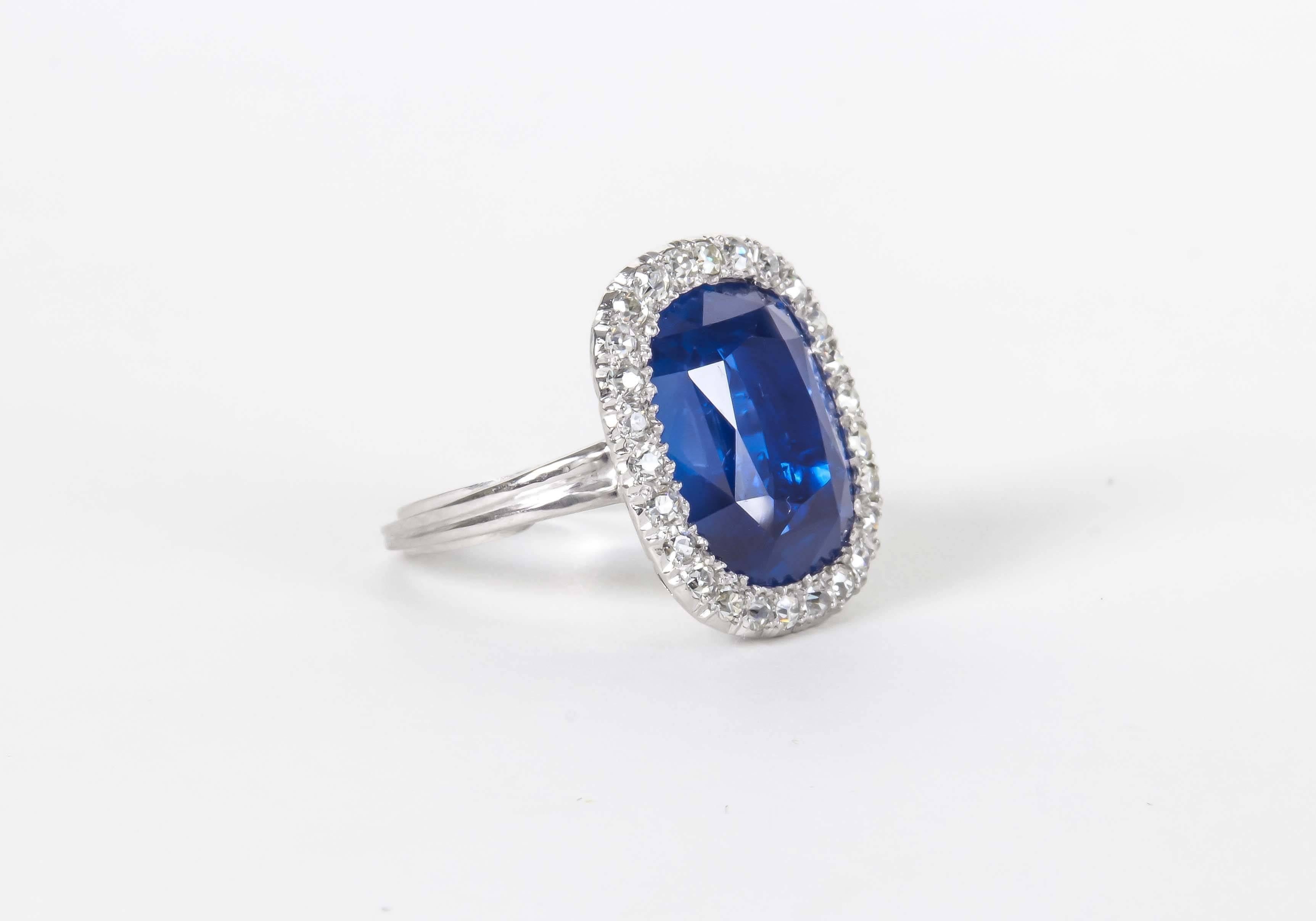 

A collectors dream!!!

A rare GIA certified 15.02 carat Cushion cut Burma Blue Sapphire with ZERO TREATMENT. NO HEAT!

This fabulous Burma Blue Sapphire is set with approximately .50 carats of F color VS clarity round single cut diamonds. A