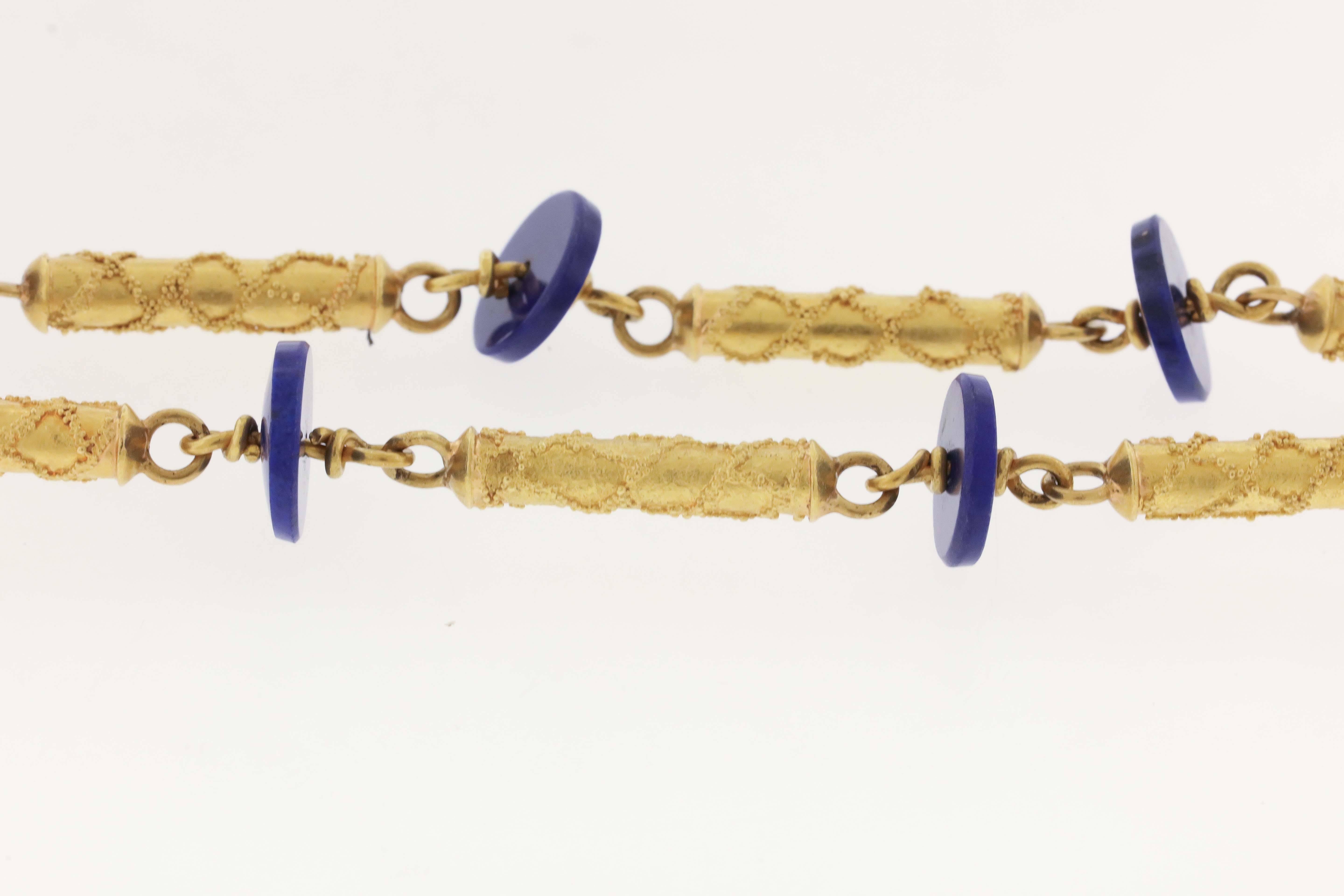 Lapis lazuli and 22K gold granulated fabricated chain, circa 1990's by Cornelia Roethel, is composed of ¾