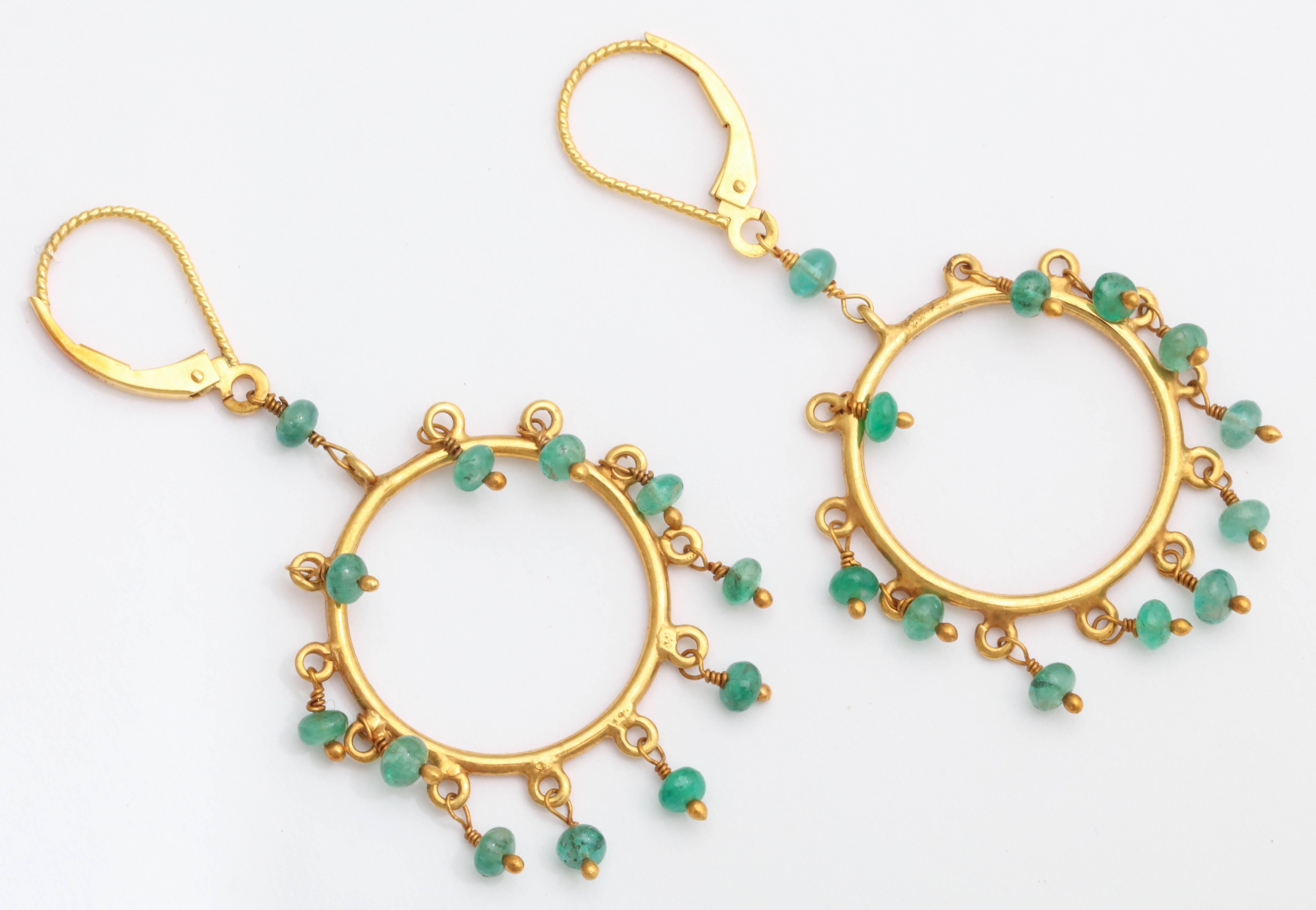 Artisan Elegant Emerald Gold Dangling Hoop Earrings For Sale