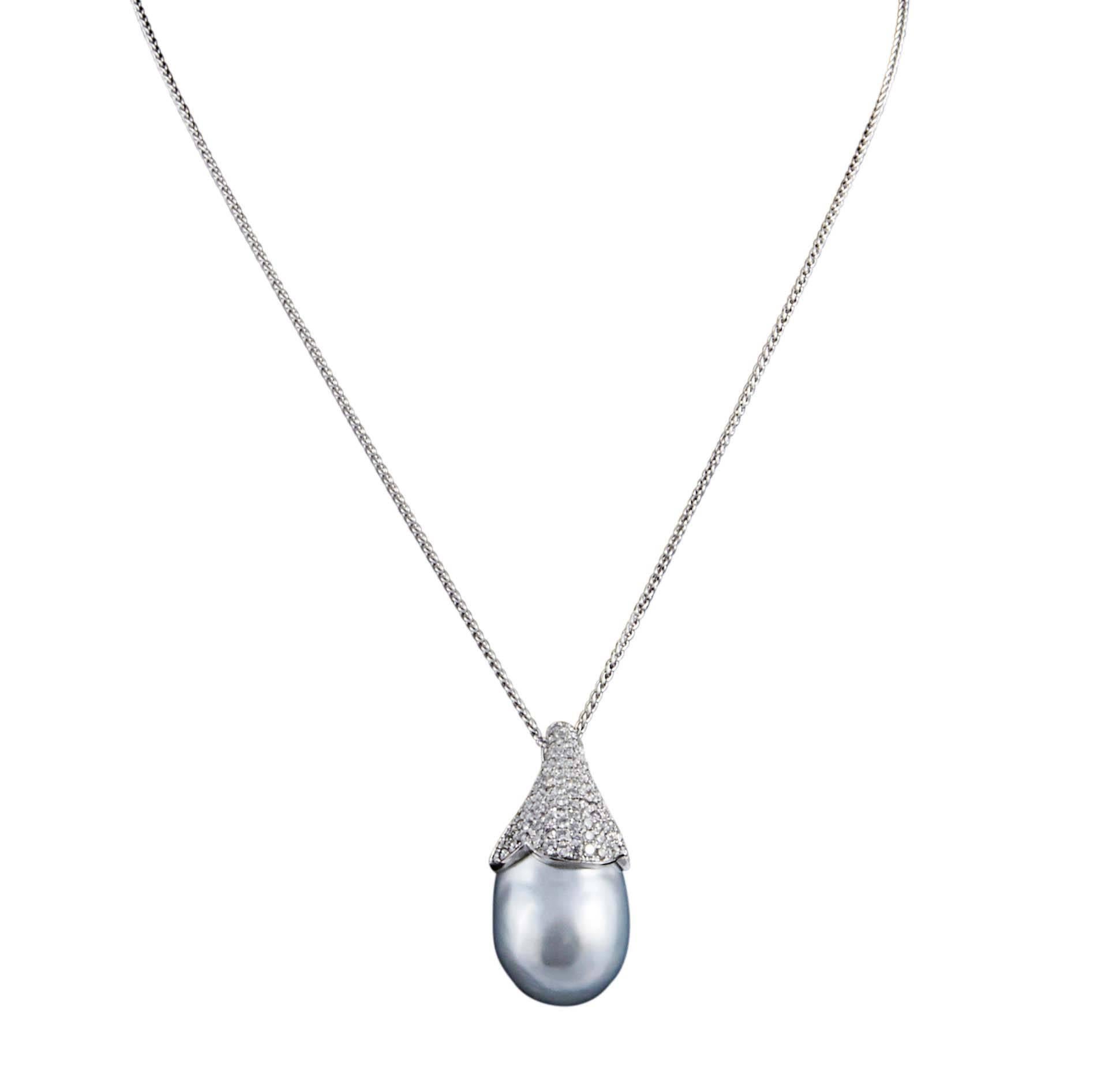 18K White Gold

South Sea Baroque Pendant 15 + mm
Total Diamond Weight: 0.89 Cts.

The Pearl is white with a silver overtone.
Natural blemishes on the pearl