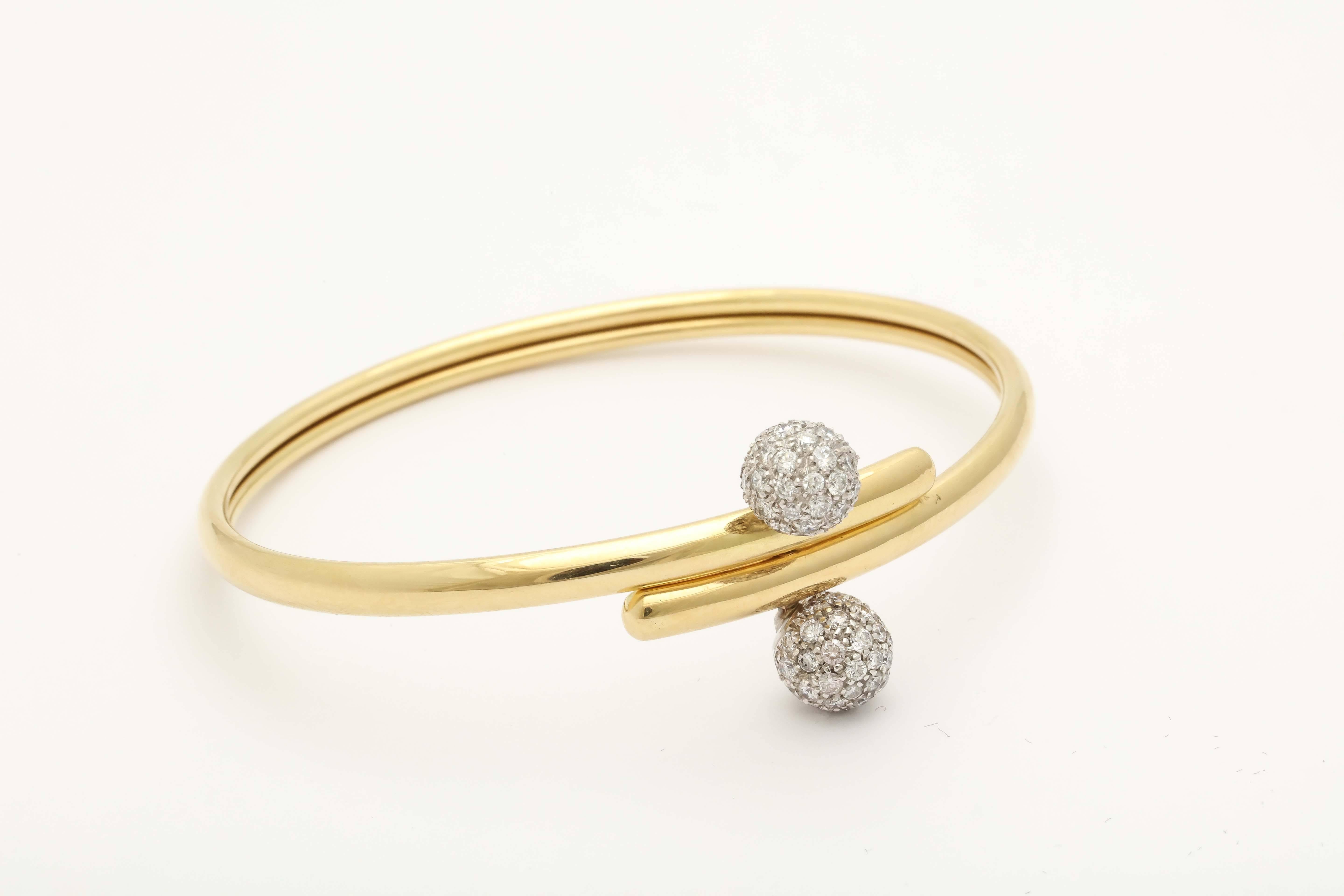 1980s Tiffany & Co. Elegant Diamond Gold Double Ball Cuff Bracelet In Excellent Condition In New York, NY