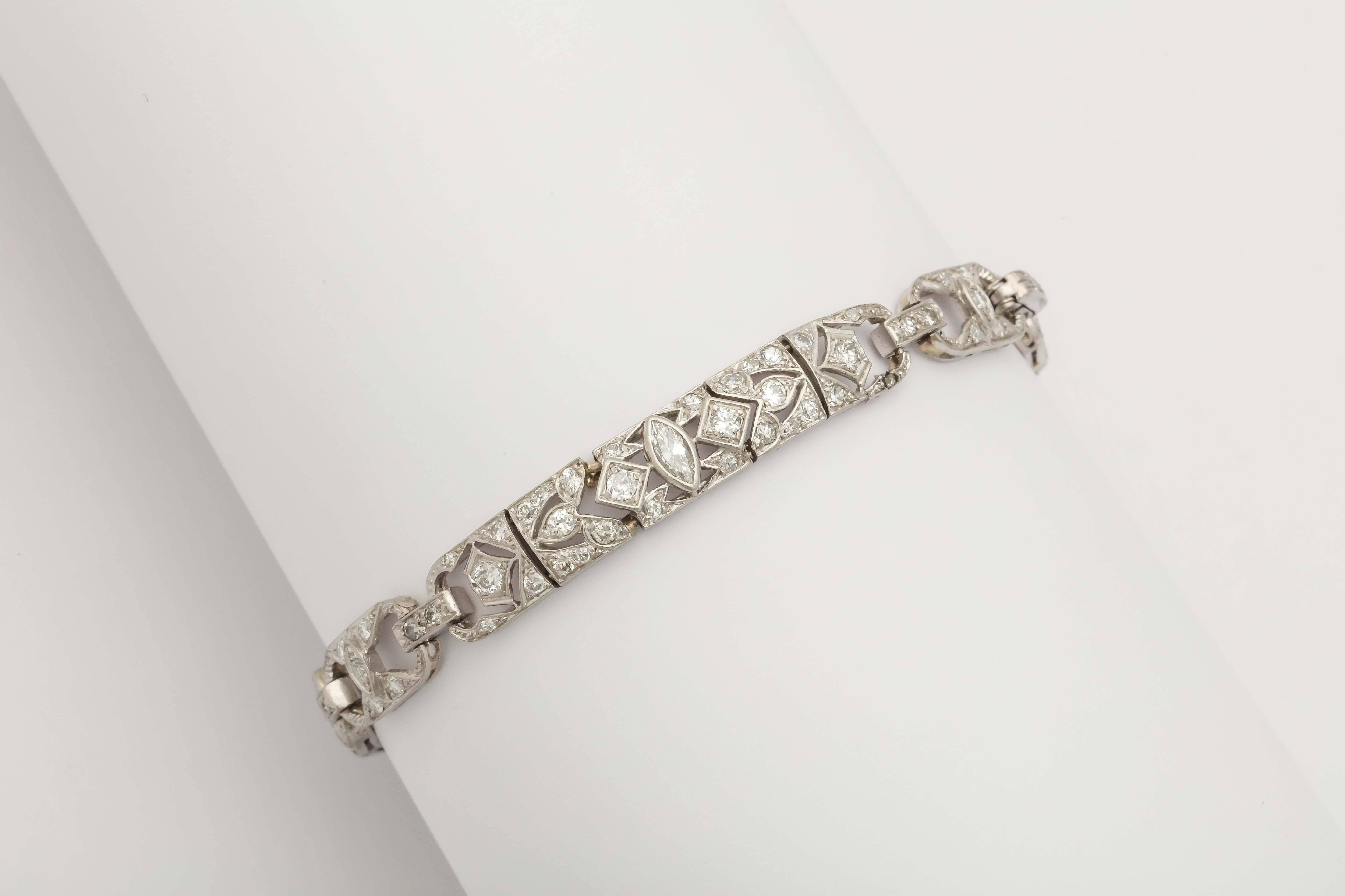 One Platinum Decorated With Diamonds Art Deco Flexible Link Bracelet Exhibiting Beautiful Open Design Craftmanship 3.50 Carats Approximate Diamond weight. Made In America In The 1920's.