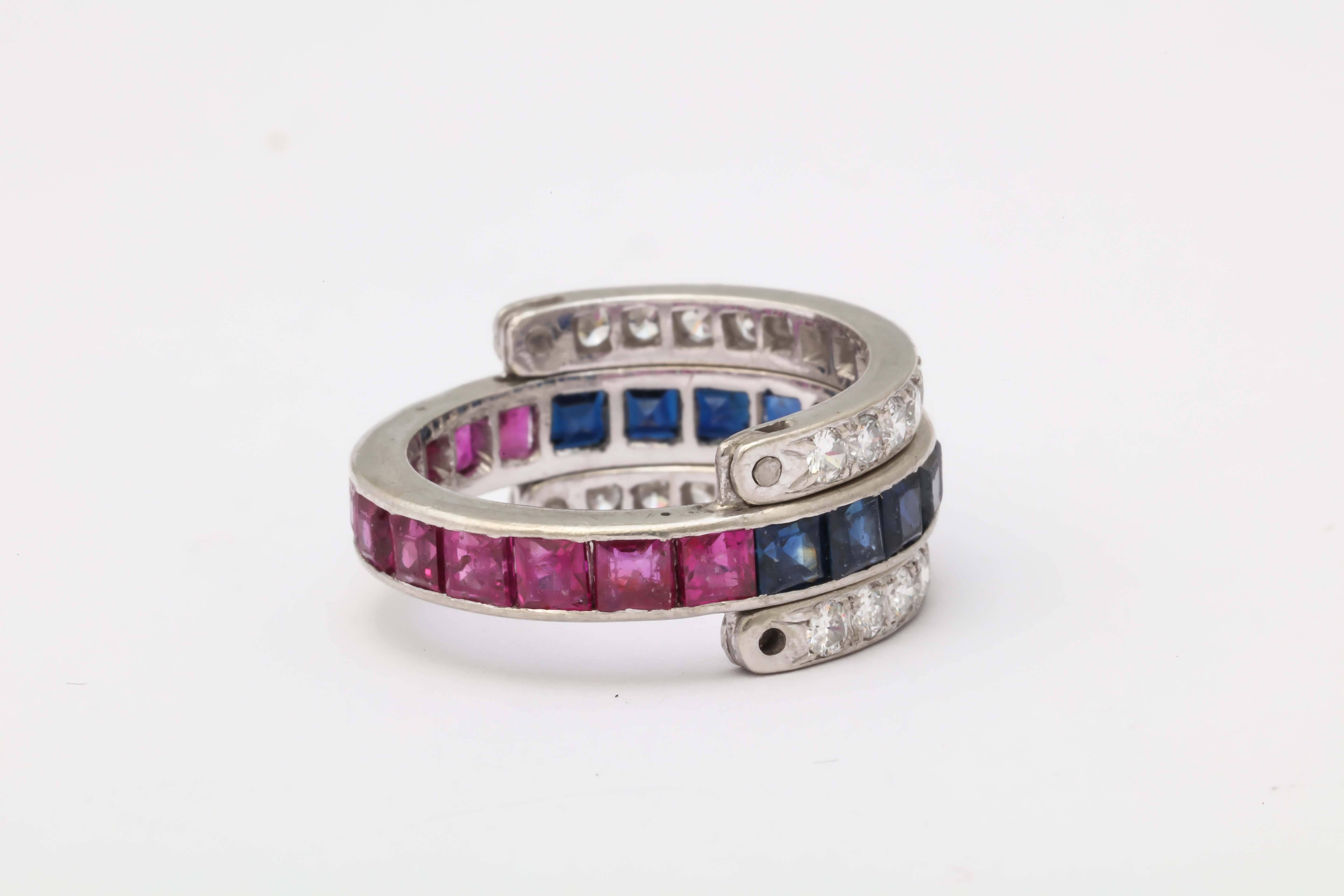 One Ladies Band Consisting Of 12 Custom Cut Square Cut Sapphires Weighing Approximately 1 carat Total Weight And Further Designed With 12 Custom Cut Beautiful Color Square Rubies Weighing Approximately 1 Carat Total Weight. Further Decorated With 2