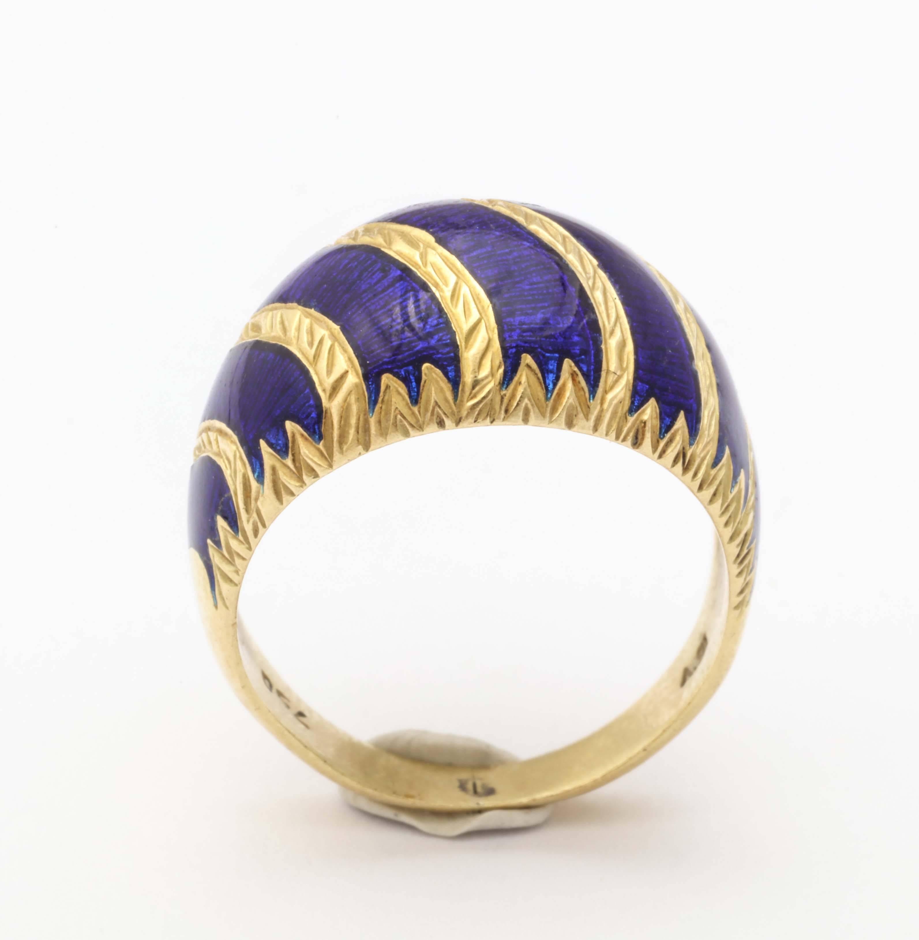 18K yellow gold dome with curved lines of blue enamel across the top. 