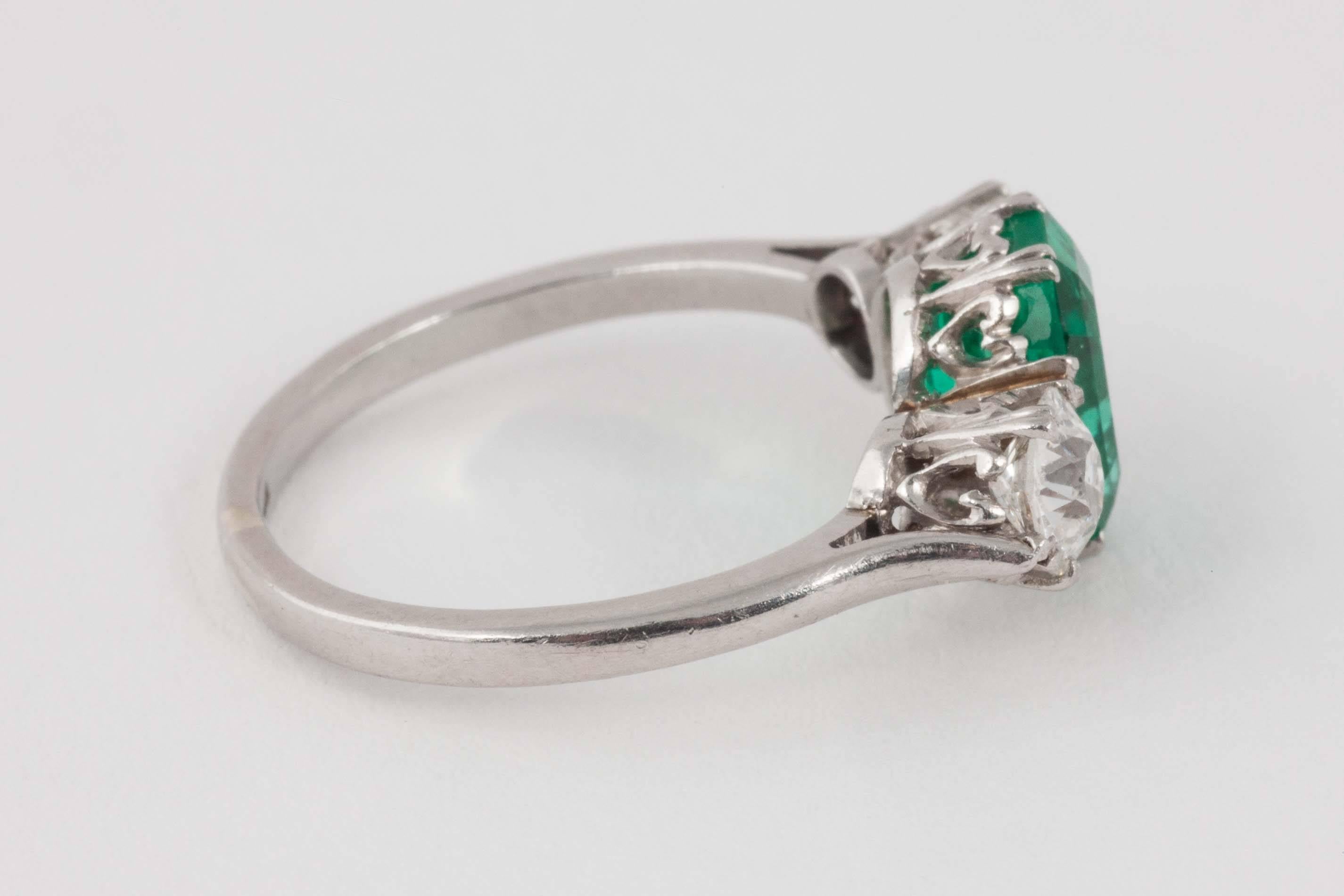 Modern Rare Russian Origin Emerald Diamond Platinum Ring For Sale