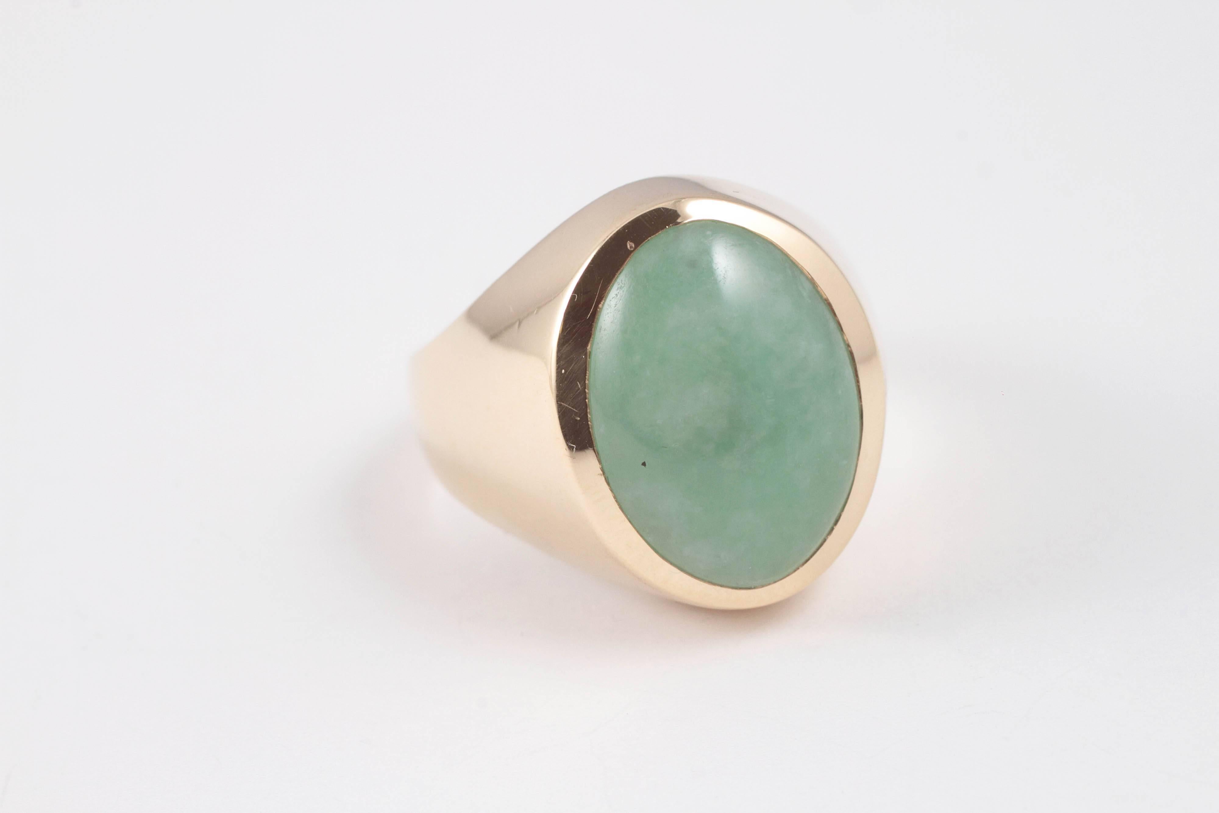 In 14 karat yellow gold, this lovely jade ring is accompanied by a Stone Group Laboratory report stating 