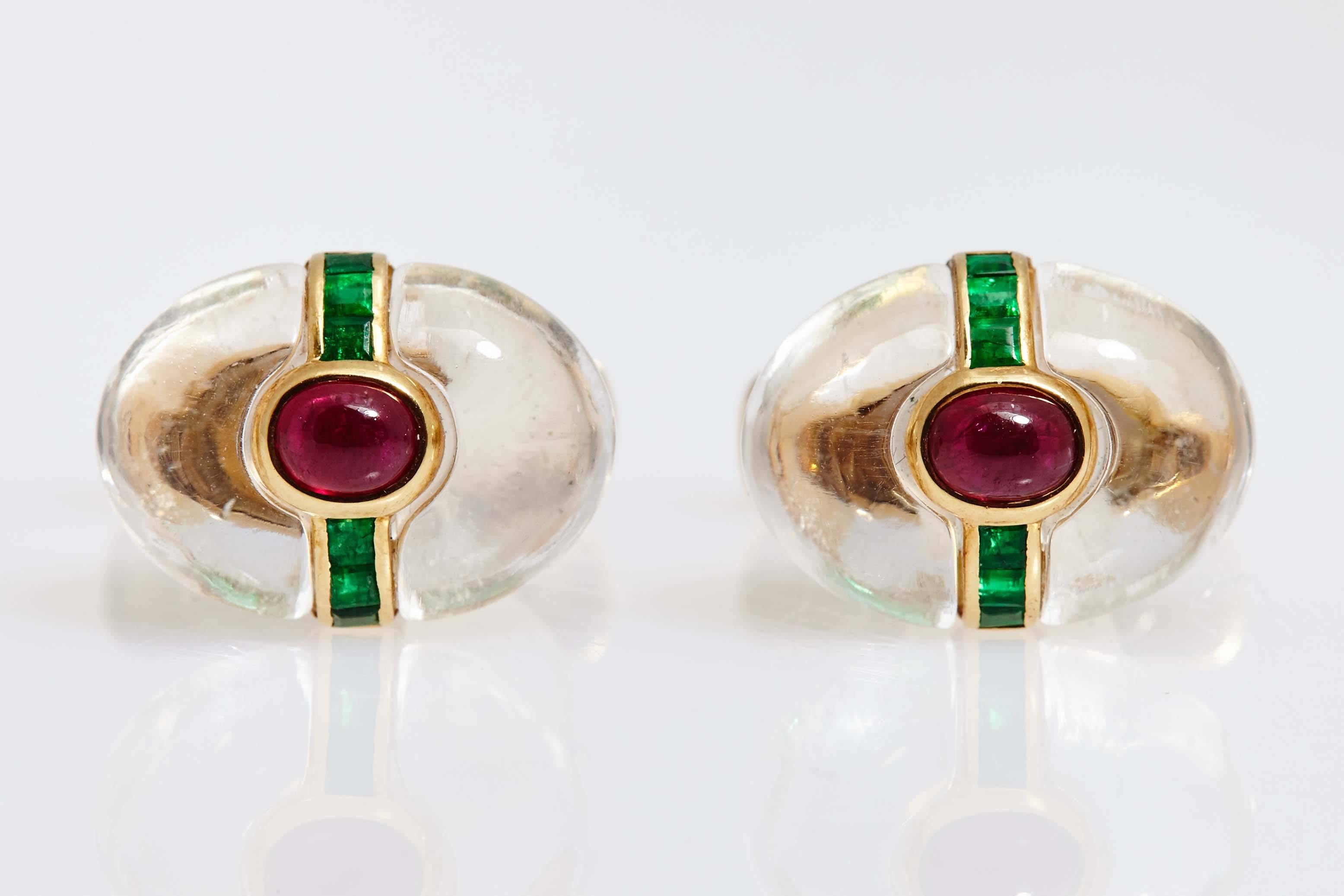 A pair of iconic Dolce Vita period cufflinks with rock crystal, cabochon rubies and emeralds, mounted on 18kt yellow gold. By Bulgari, circa 1965.