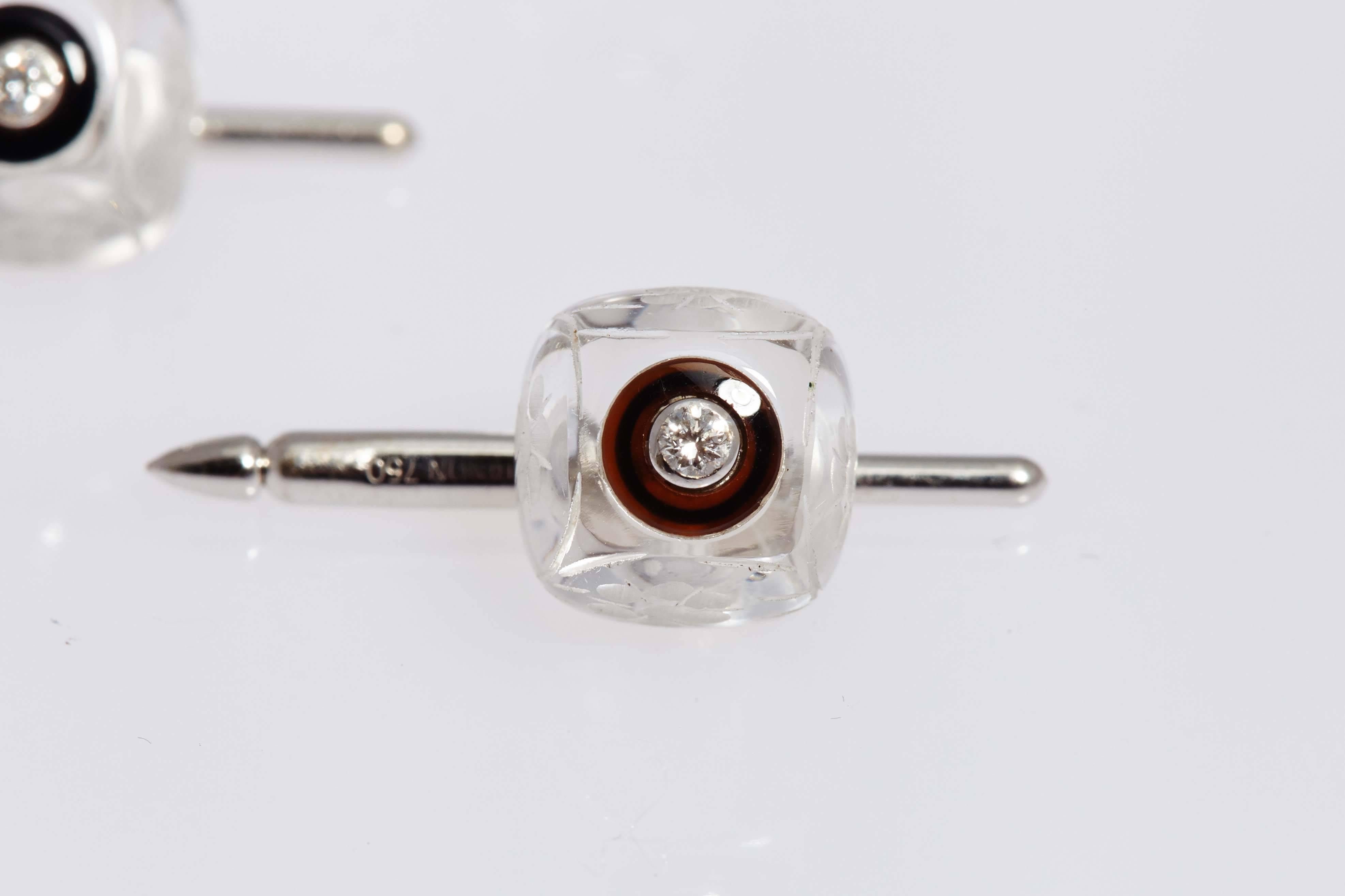 A set of elegant cufflinks and shirt studs in rock crystal, onyx and diamonds. Mounted on 18kt white gold. Circa 1980 