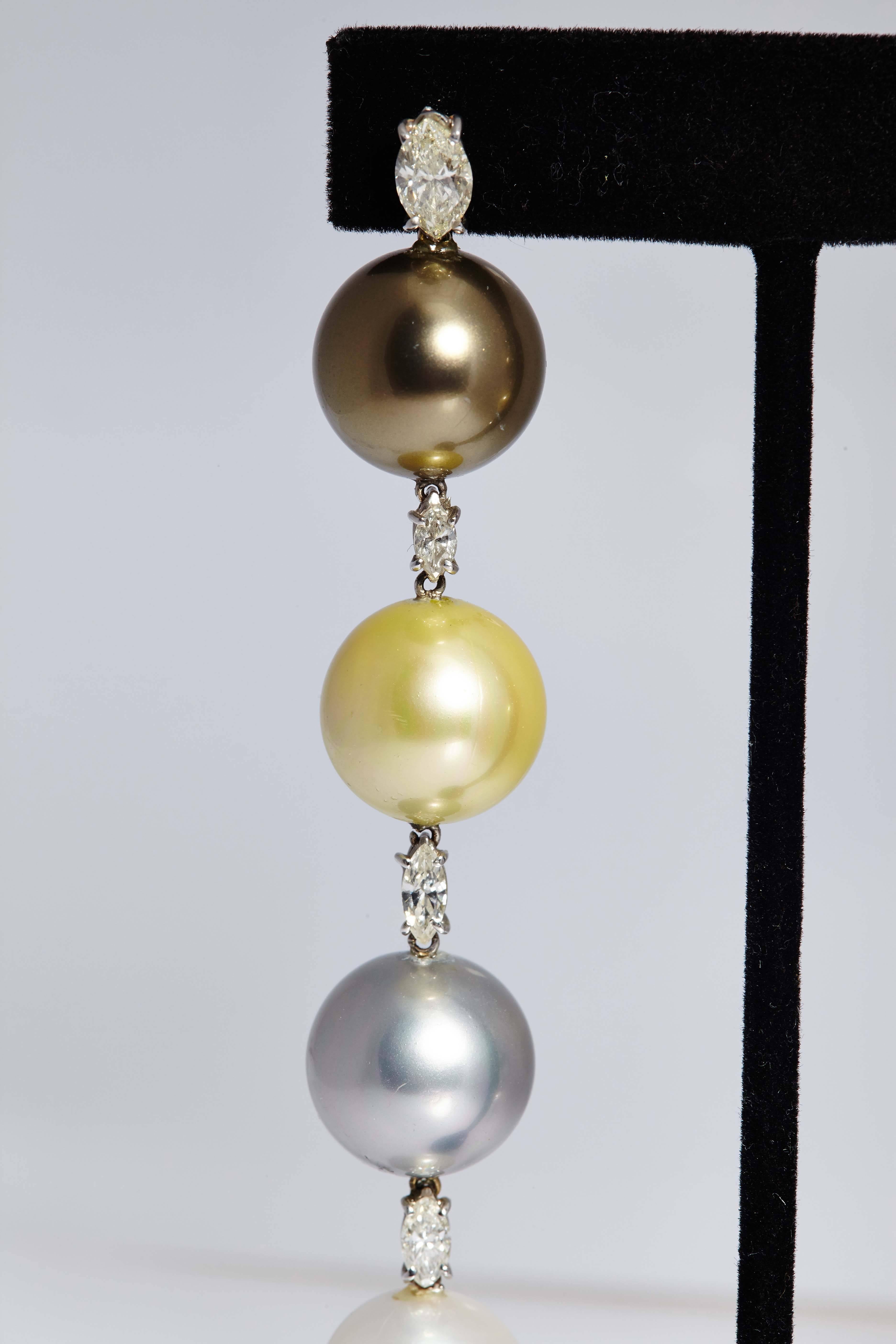 An impressive White Gold Ear Pendants with Multi-Color Cultured Pearls, Marquise-Cut Diamonds and Diamond Briollettes, Diamonds weight: 5.50cts. Made in Italy circa 1980. 