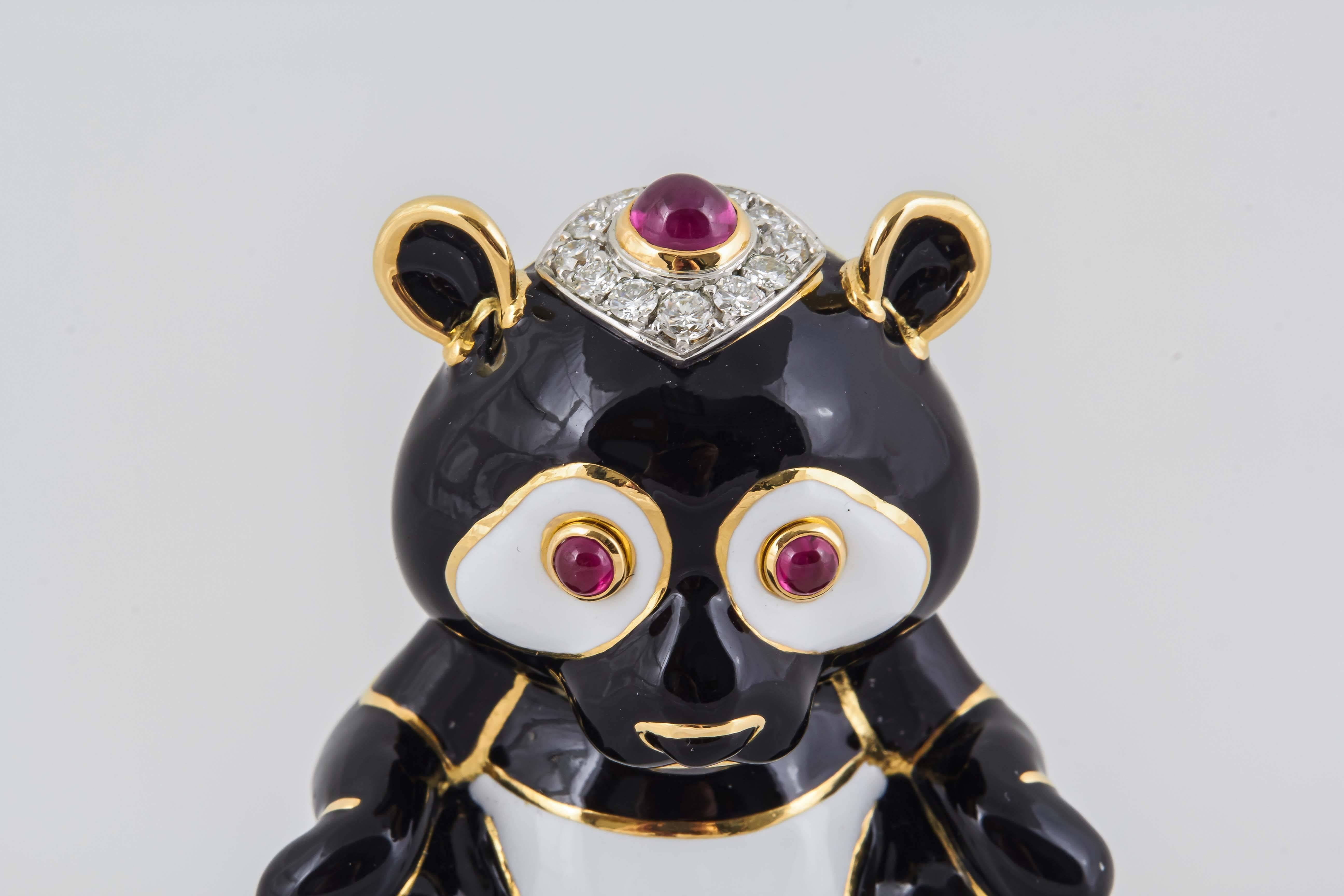 Beautiful Panda Brooch finely crafted in 18k yellow gold with black and white enamel, with diamonds and rubies, signed by David Webb.


