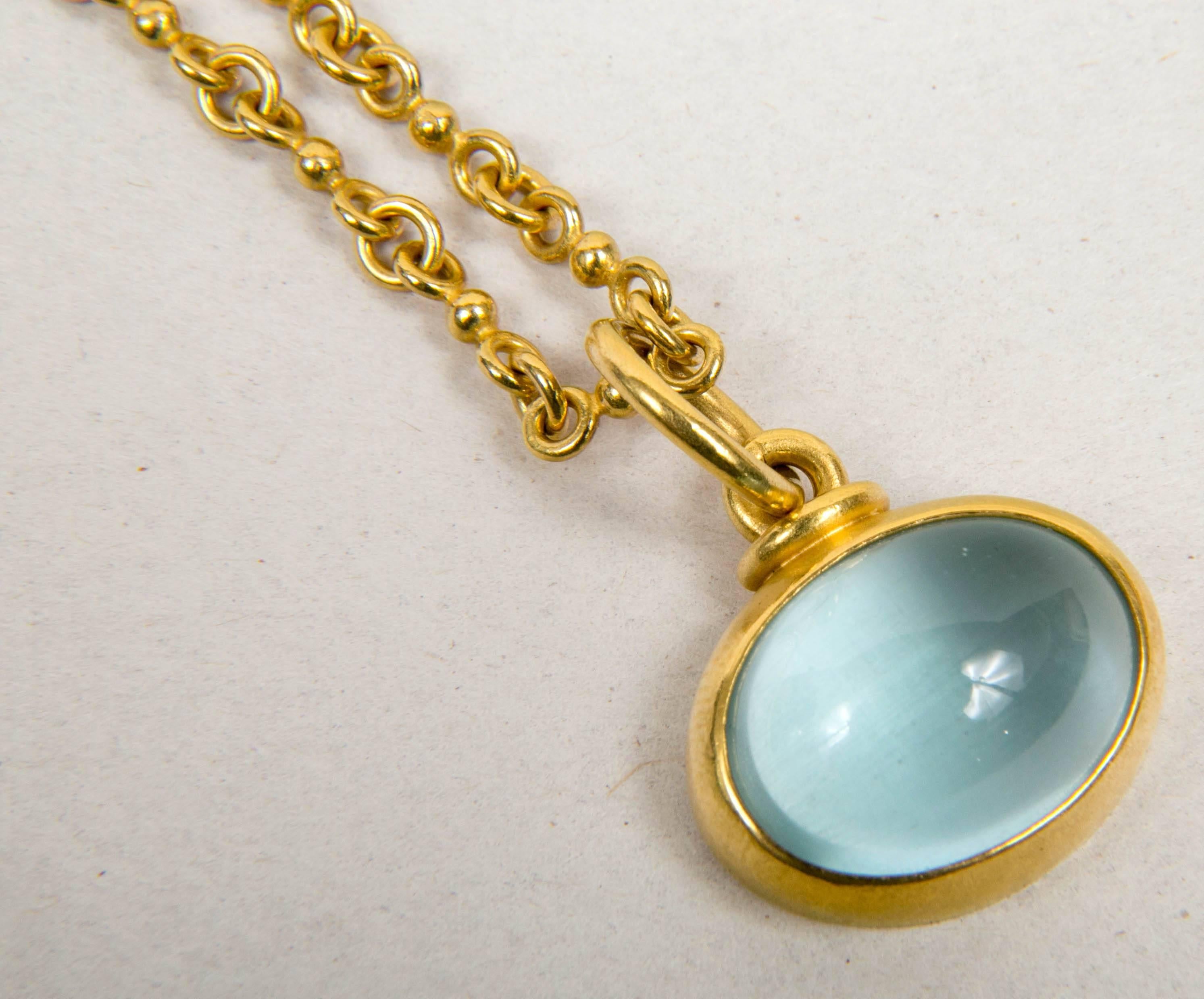 By Denis Belesh. Chain constructed with 22k yellow gold, clasp is 18K for safety. Pendant: 20 carats Green Moonstone with 