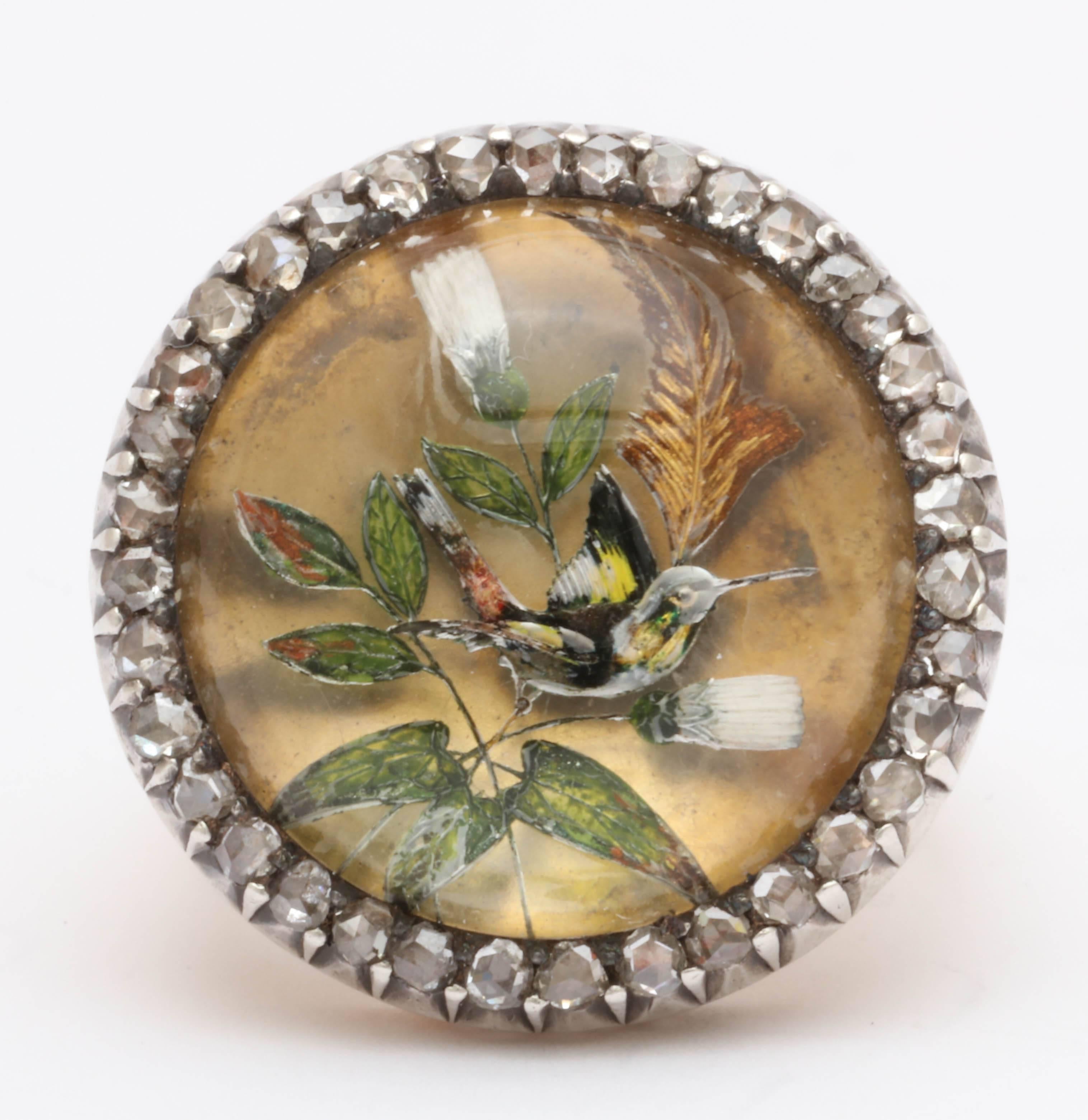 This ring is truly exceptional. Originally a brooch and now mounted as a ring, it is a reverse intaglio in Essex crystal. The process to make a piece like this is a long and highly skilled effort of multiple craftsmen. First the rock crystal is cut