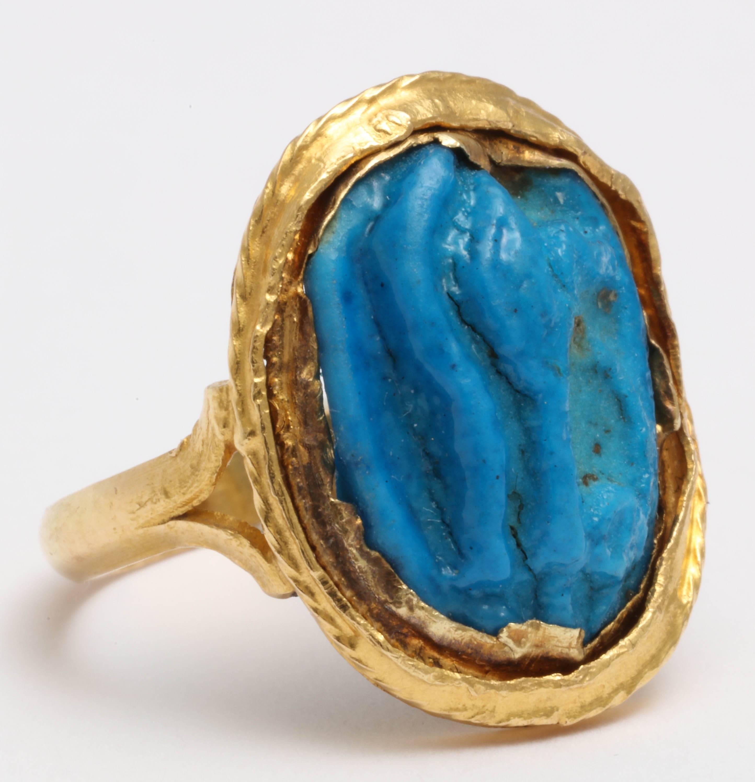 Ancient Faience Amulet - Eye of Wajdi  - mounted in a hand made 22kt Yellow Gold setting.
Setting marked with Arabic Hallmarks. Size 5 1/4