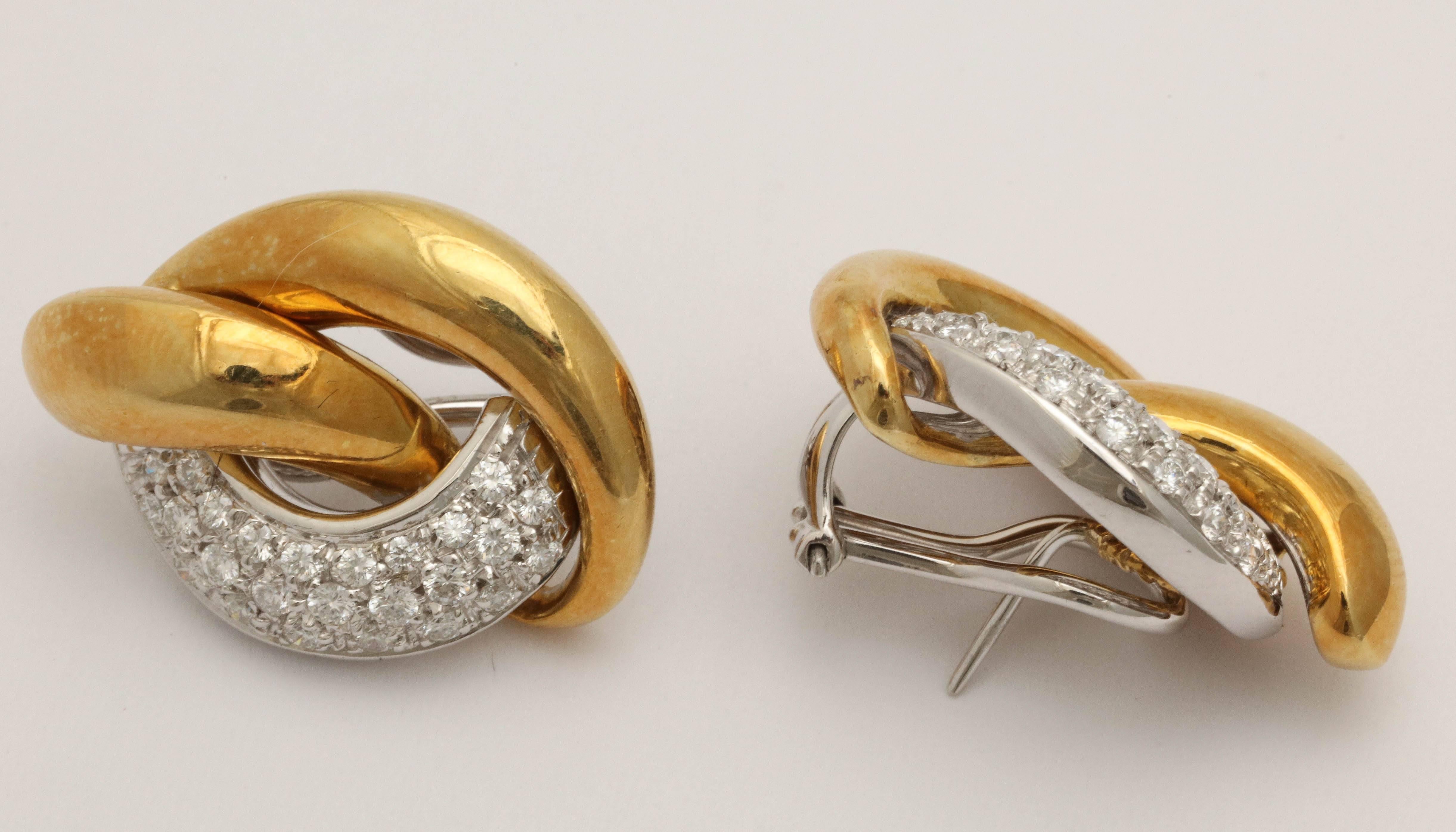 18kt Yellow Gold and Pave Diamonds Earrings.  Gold Hoops with a Pave Diamond Hoop making up an elegant Triad to embellish the Ear.  Ca. 1960.  Omega backs with a post for secure comfort.
