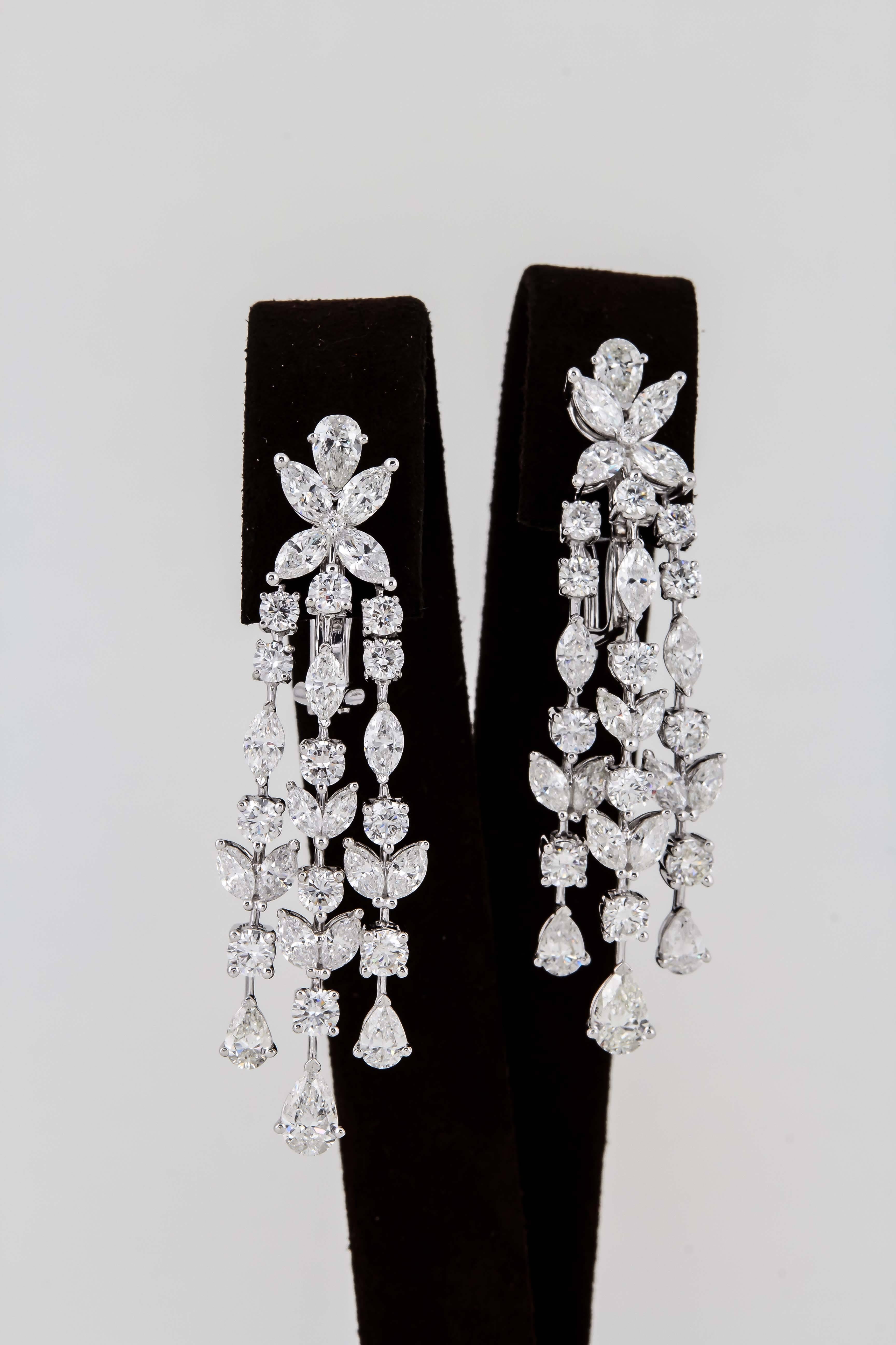 
A fabulous pair of diamond chandelier earrings. 

12.36 carats of high quality F/G color VS clarity diamonds set in 18k white gold. 

The same earrings can be found in the highest jewelry houses for 5x the price. 

Approximately 2.20 inches in