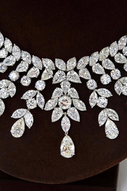 

This necklace is a WOW! A real statement piece!

Over 150 carats of F/G color VS clarity diamonds set in platinum.

This necklace features a 2.50+ carat drop and large diamonds around 2 carats and over 1 carat. 

Please contact us for more