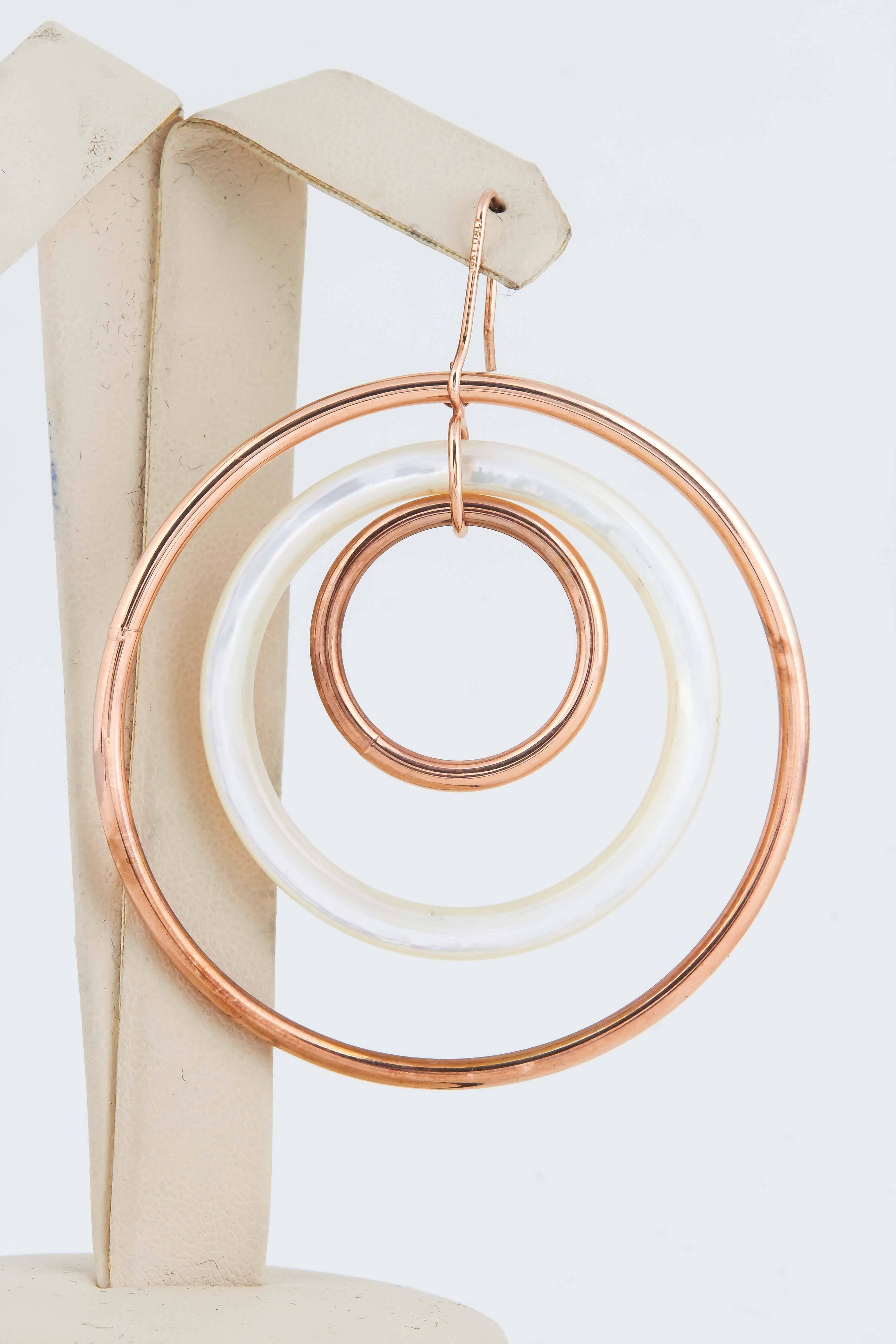 18kt Pink Gold Triple Loop Earrings Composed Of [2] Pink Gold Loops Which Are Centered By [1] Mother Of Pearl Custom Cut Loop. Earrings Are Flexible And Moveable Made With Shepard's Hooks Closures For Pierced Ears Only . Designed In America By