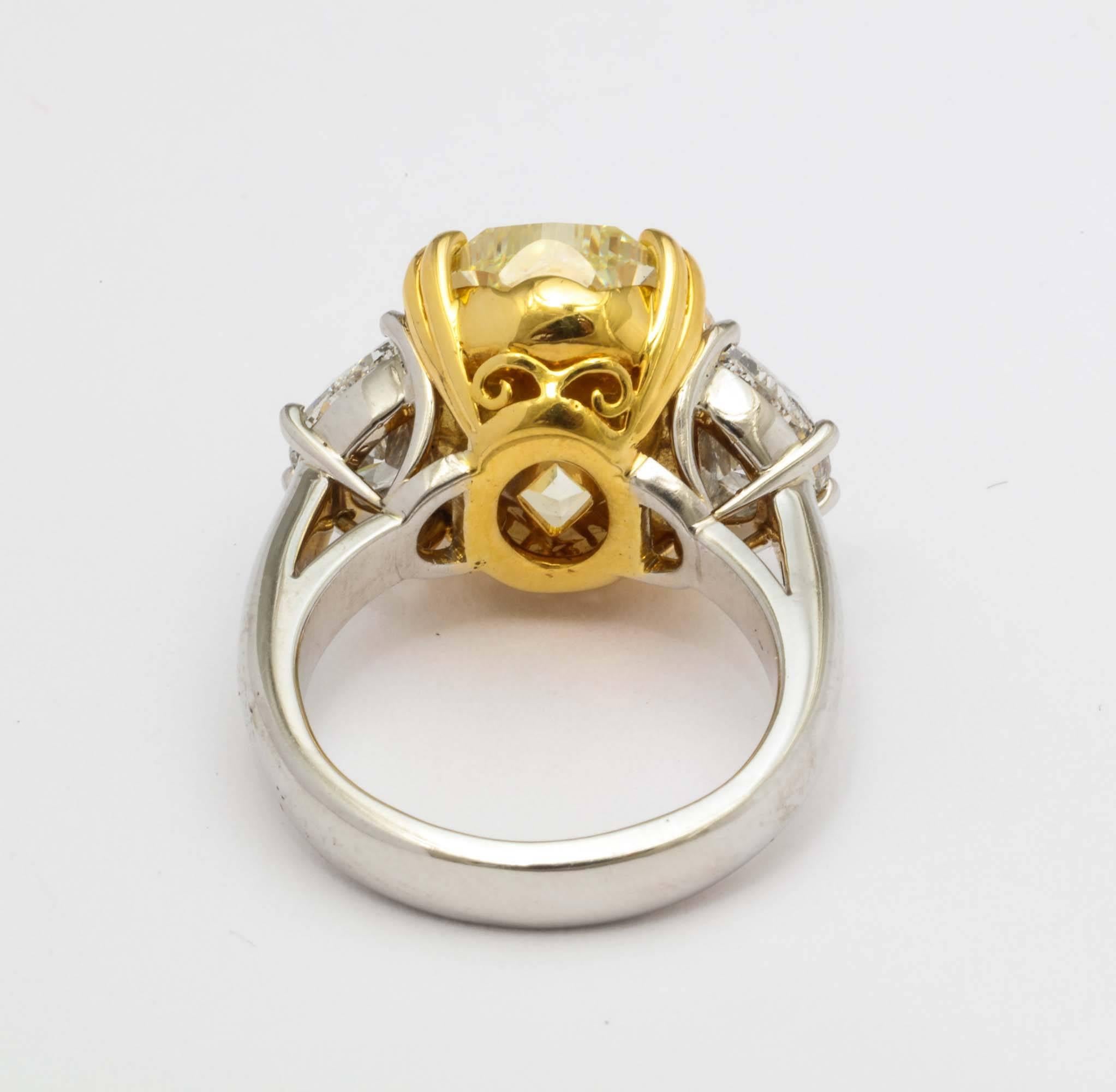 Oval Cut Platinum Gold and Fancy Color Oval Diamond Ring