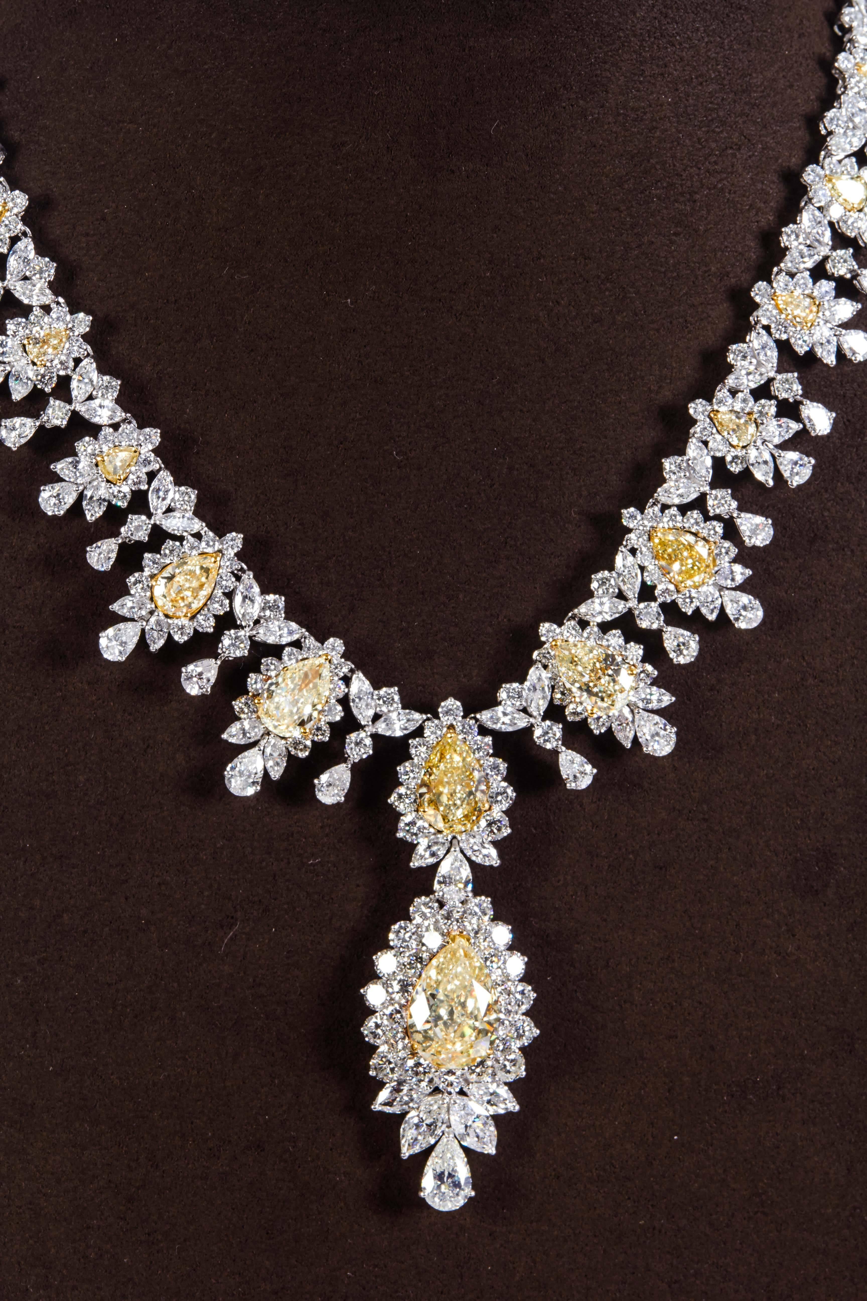 

A beautiful and important yellow diamond necklace with yellow diamond drop.

31.86 carats of yellow diamonds and 68.35 carats of white diamonds set in 18k yellow gold and platinum. 

The necklace features an over 9 carat pear shape drop as