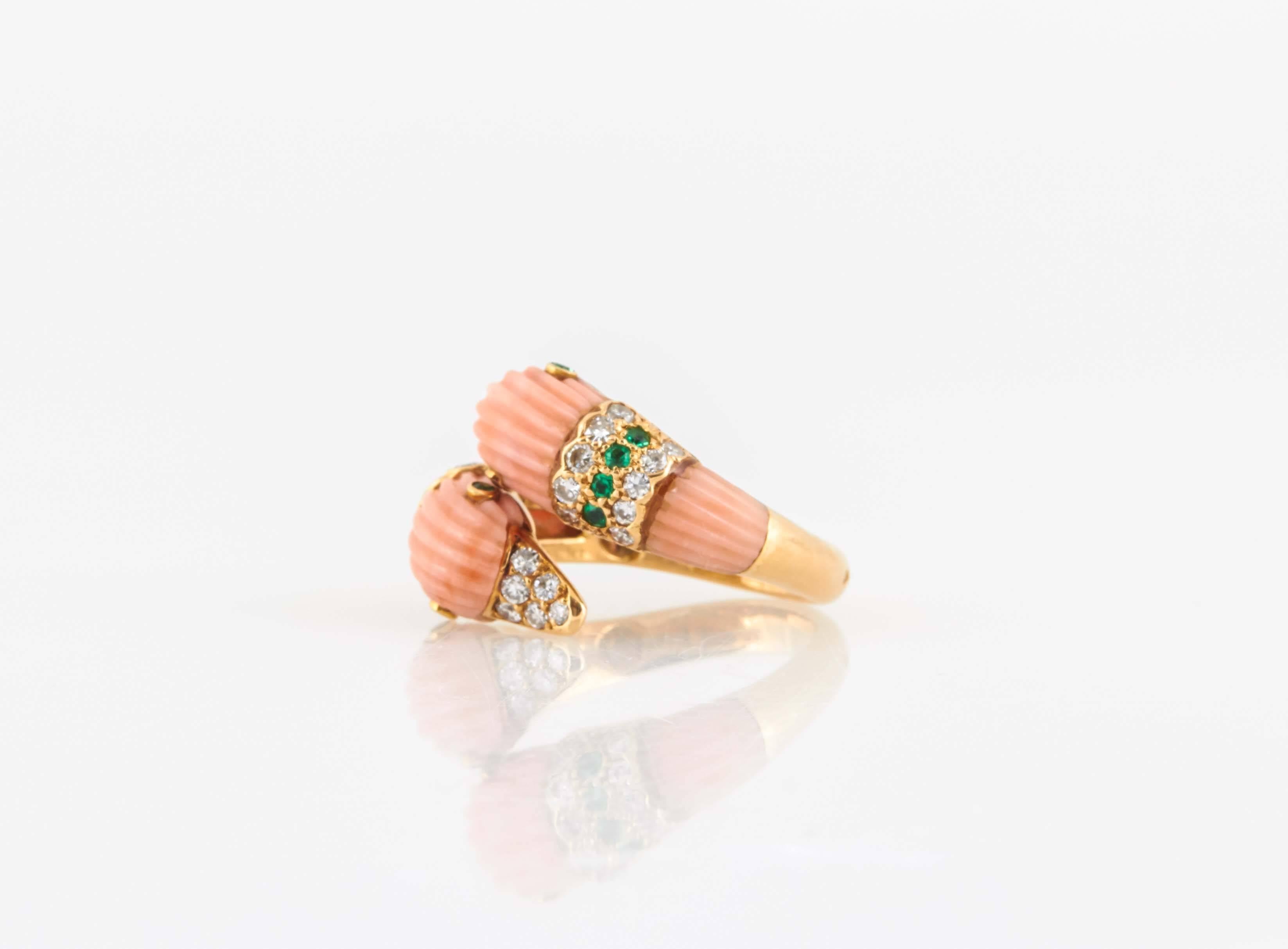 Coral Duck Head finely crafted in 18k yellow gold with emeralds and round brilliant cut diamonds. Signed by Van Cleef and Arpels. Number# C5013.