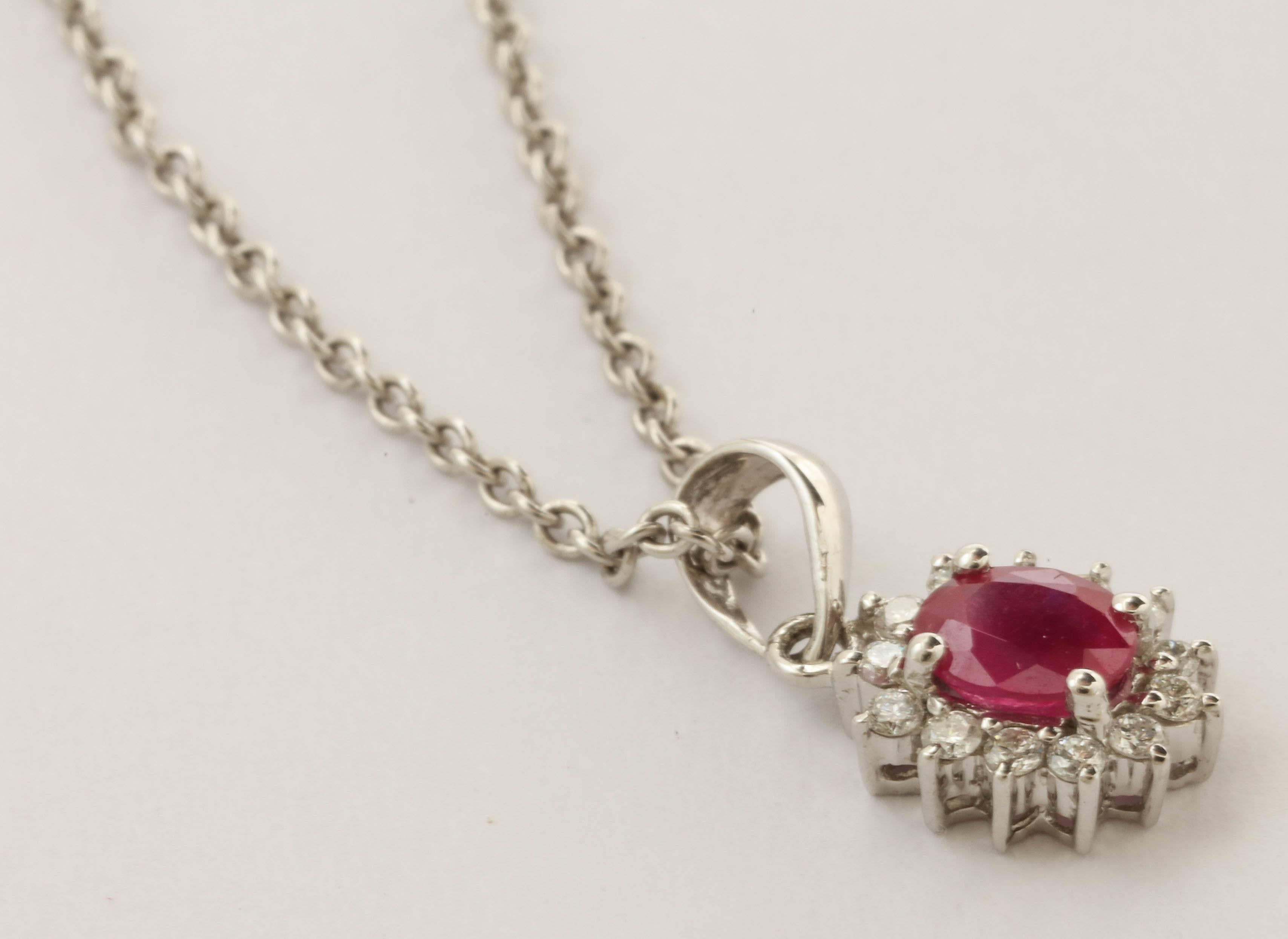 Contemporary Charming Ruby and Diamond Pendant For Sale