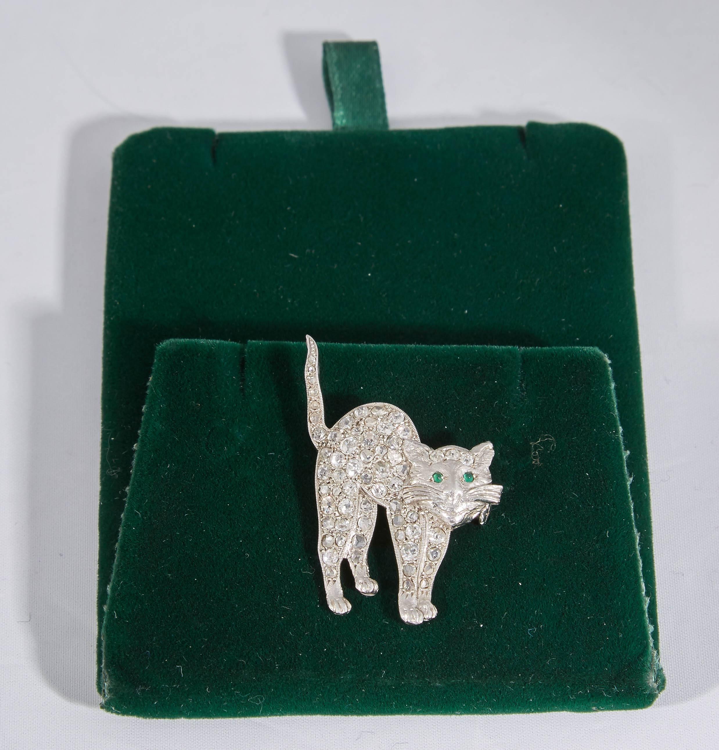 One Platinum And Diamond Antique Cut Diamond Figural Kitty Cat Brooch Beautifully Bead Set Diamonds Weighing Approximately 2 Carats Embellished with 2 Cabochon Emerald For Eyes. Beautiful Platinum Workmanship Exhibited by Handmade Craftmanship For