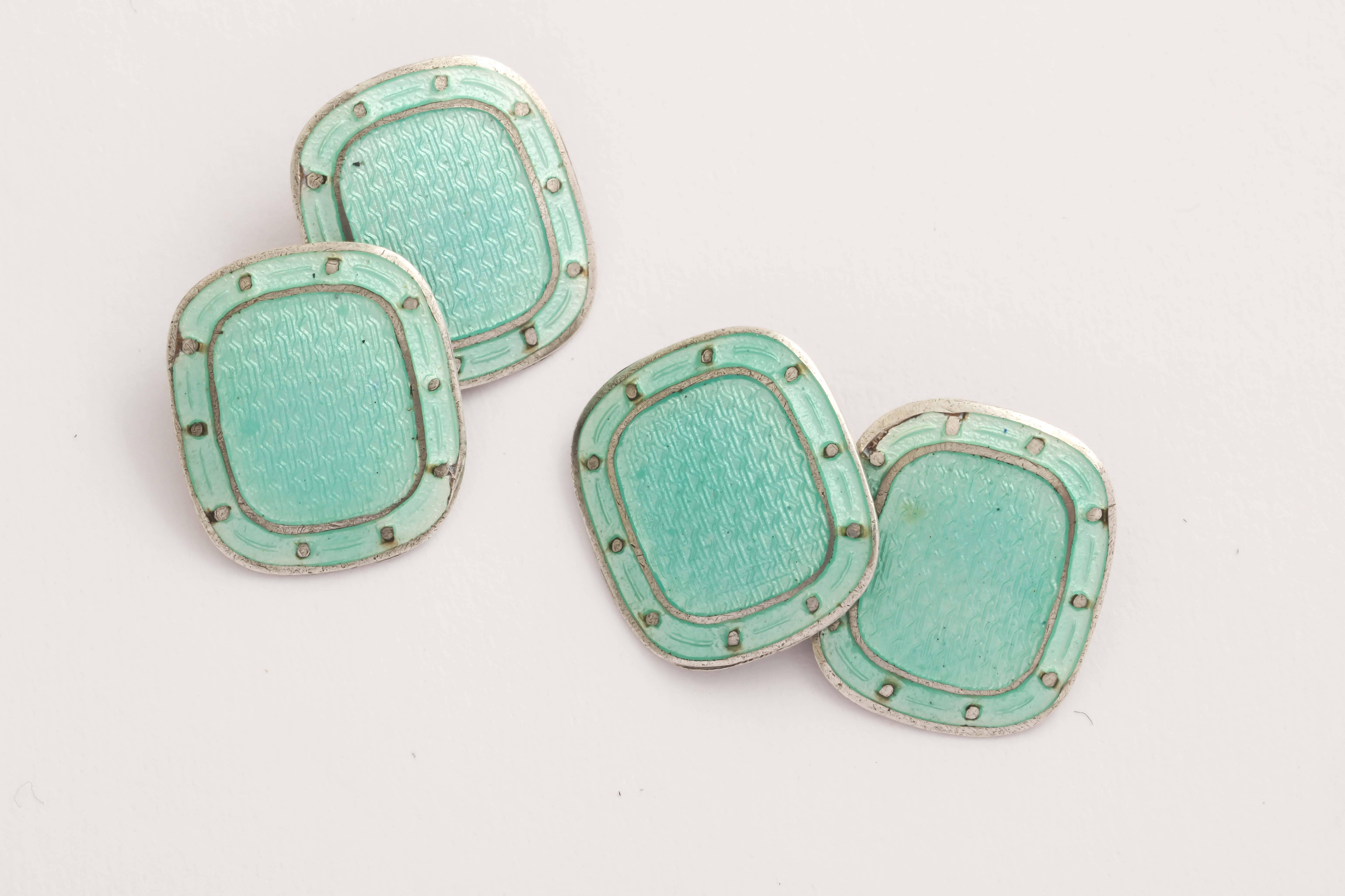 Rounded rectangular aqua with border of silver dots.
Impressed STERLING.
