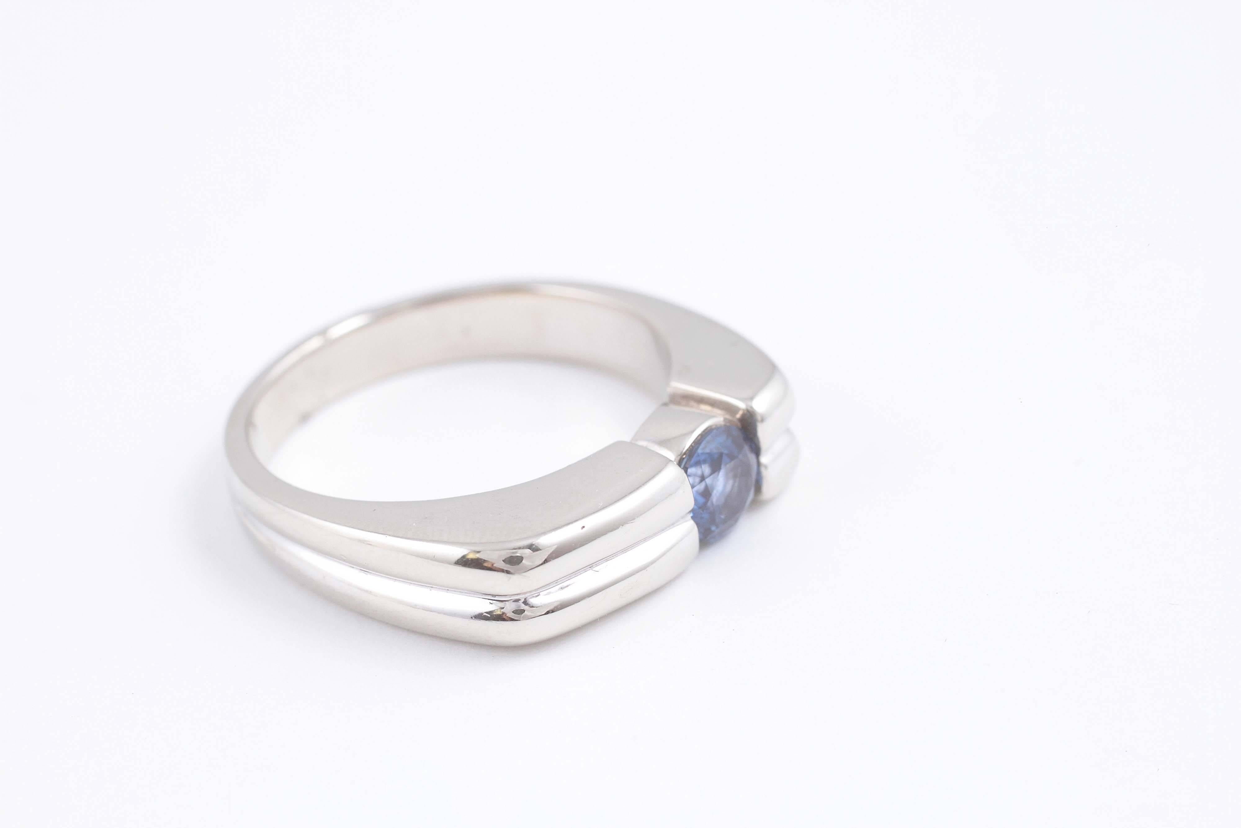 Lovely shade of blue!  14 karat white gold ring, size 10 1/2.