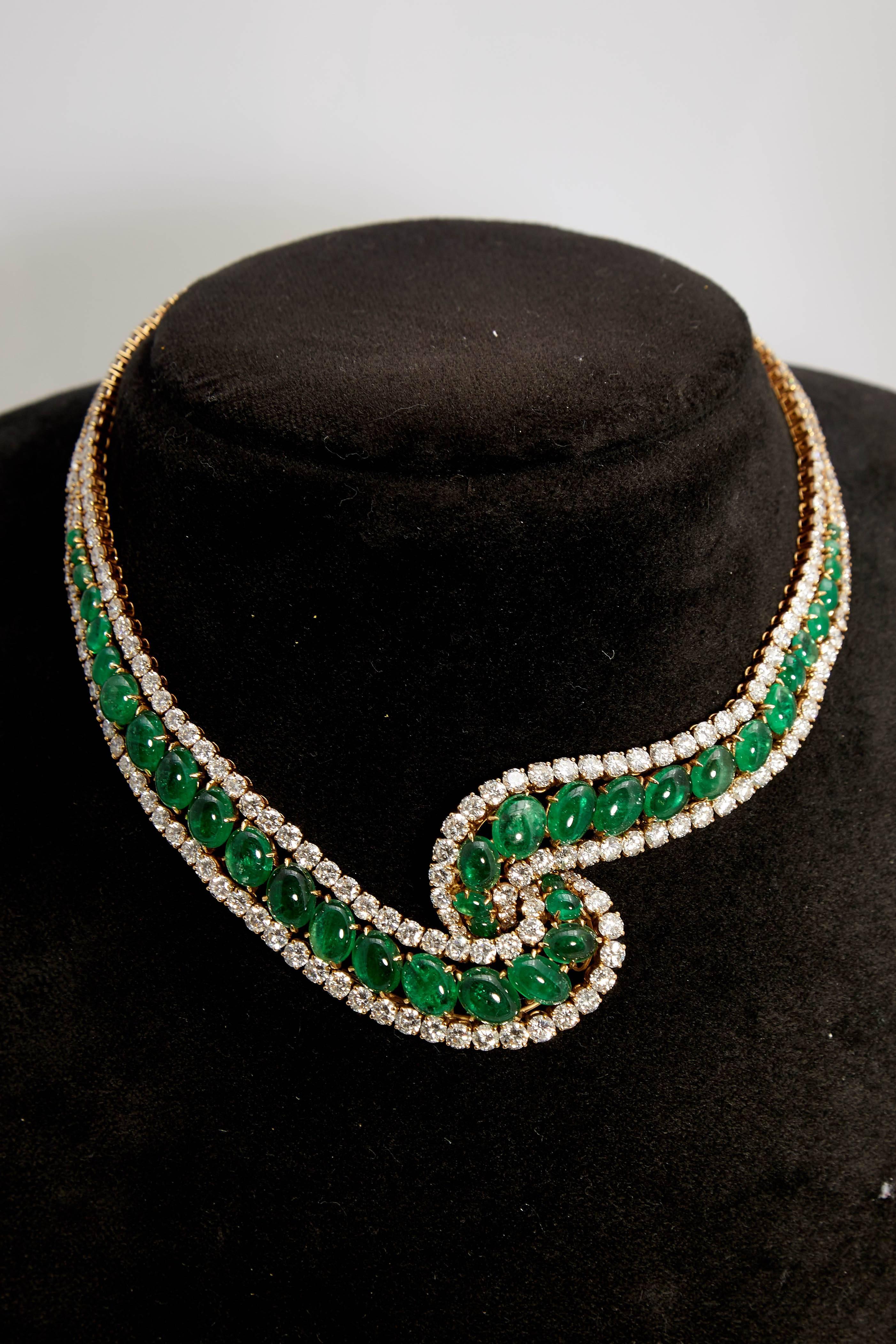 An impressive Colombian cabochon emerald (45 carats) and diamond (38cts) necklace or undulated design. Made in Italy, circa 1960. 