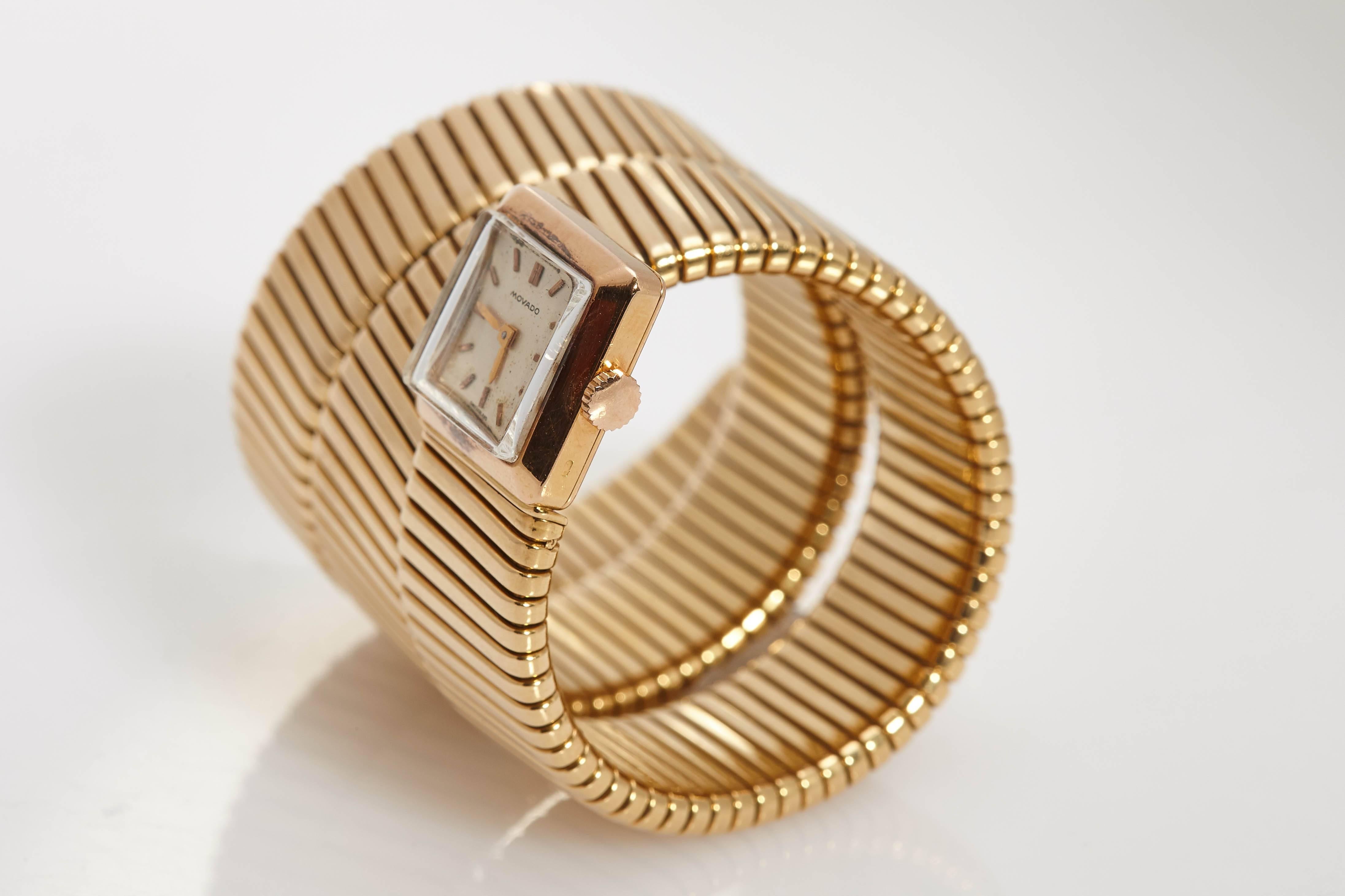 An unusually large version of the everlasting Bulgari Tubogas lady's watch-bracelet, carrying a Movado movement. Mounted in 18kt yellow gold. Made in Italy, circa 1965.