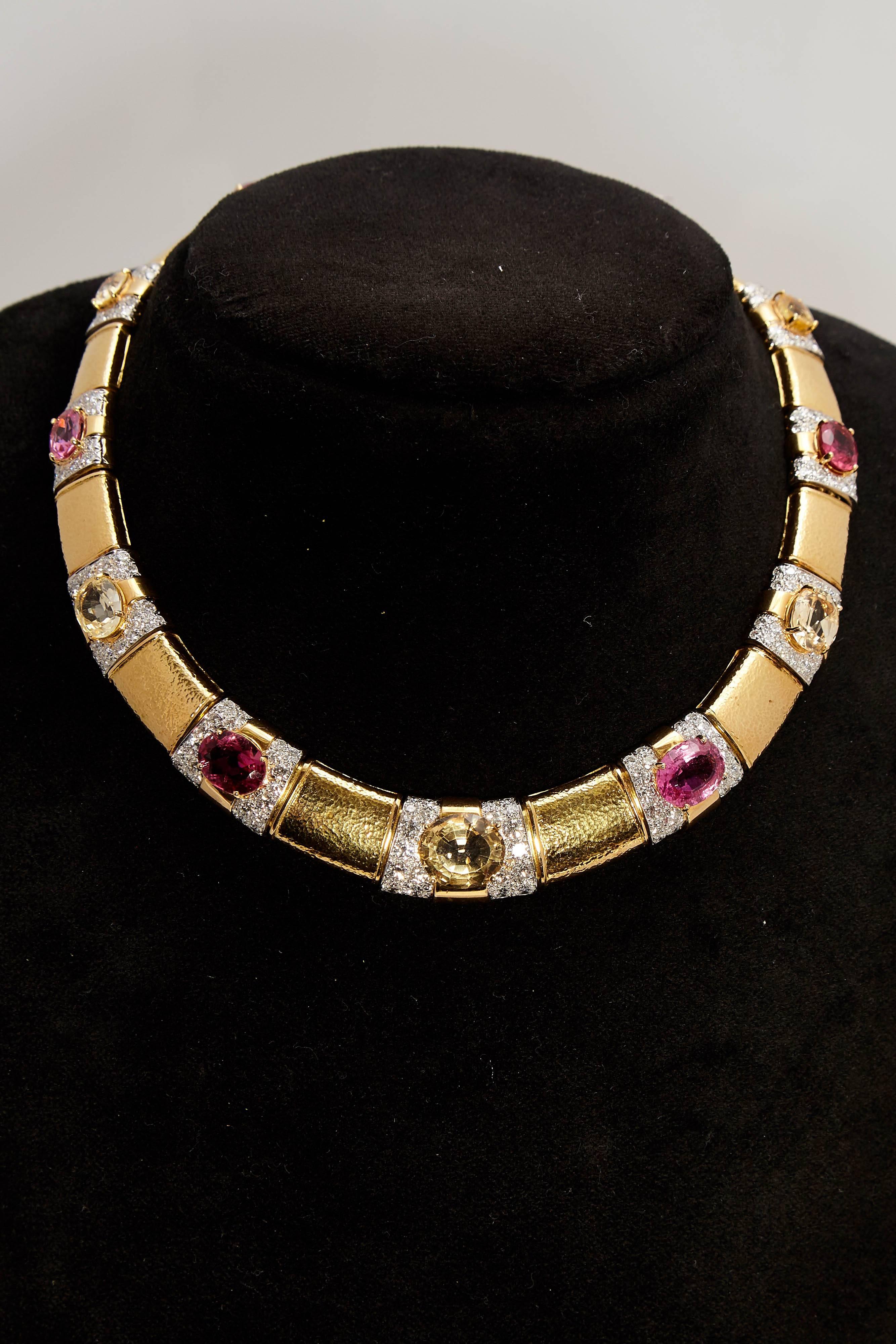 An impressive pink and yellow sapphire necklace, highlighted by brilliant cut diamonds, mounted on 18kt yellow gold. Signed David Webb, circa 1975. 